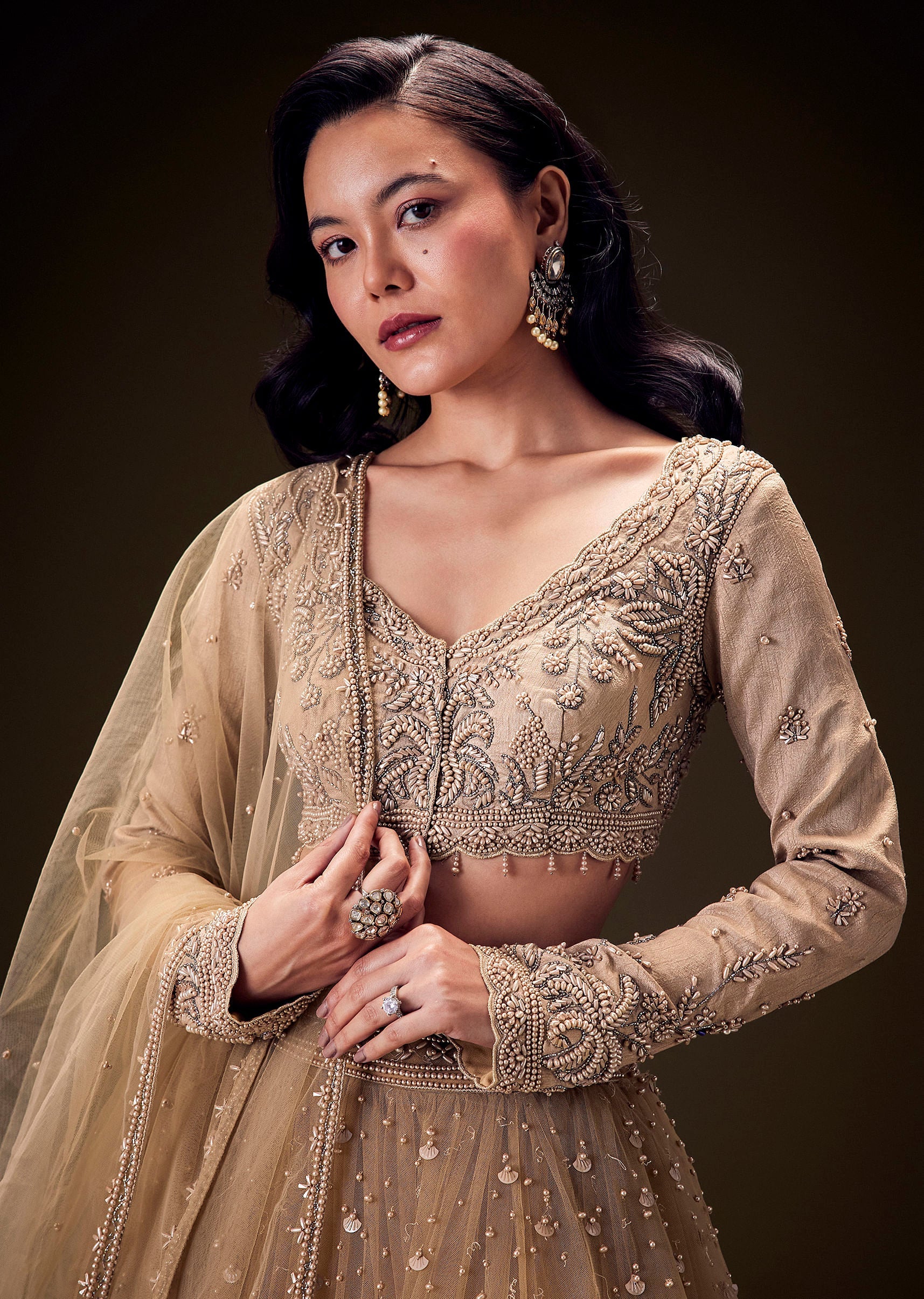 sand_beige_net_hand_embroidered_pearl_work_lehenga_set-sg276660_2_726f2526-6a42-4a80-9057-7874ed78523f.jpg