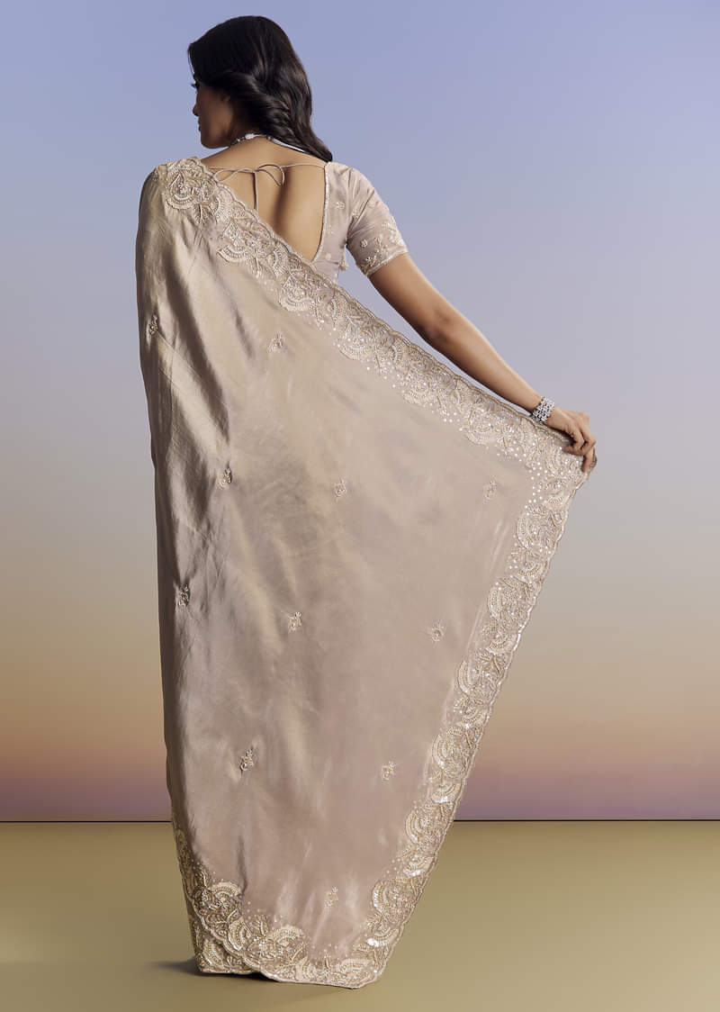 silver-tissue-saree-with-embroidered-scallop-border-and-sequin-moti-work-sg319865-4_95f22741-70c9-447a-8a15-ebfdfa711d6b.jpg