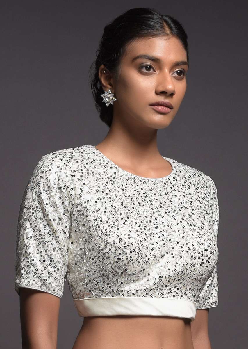 silver-white-blouse-in-sequins-fabric-with-satin-hemline-and-half-sleeves-online-kalki-fashion-m001ps29y-sg39096_4_60d86717-5a0c-46ce-81eb-327372771e3c.jpg