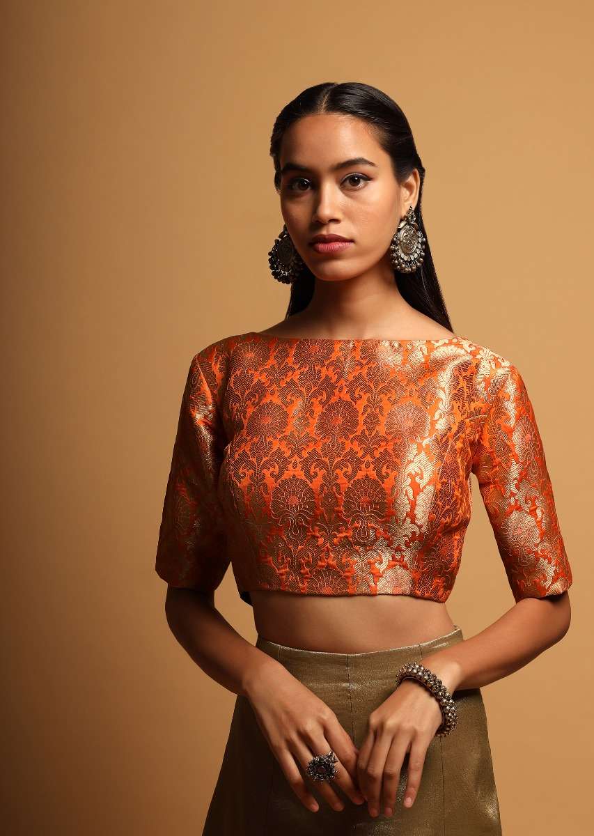 tangerine-orange-blouse-in-brocade-silk-with-woven-floral-jaal-and-34th-sleeves-online-kalki-fashion-m001459180y-sg33914_4_be94de42-1f07-4753-a6e1-83c0c0f74ec6.jpg