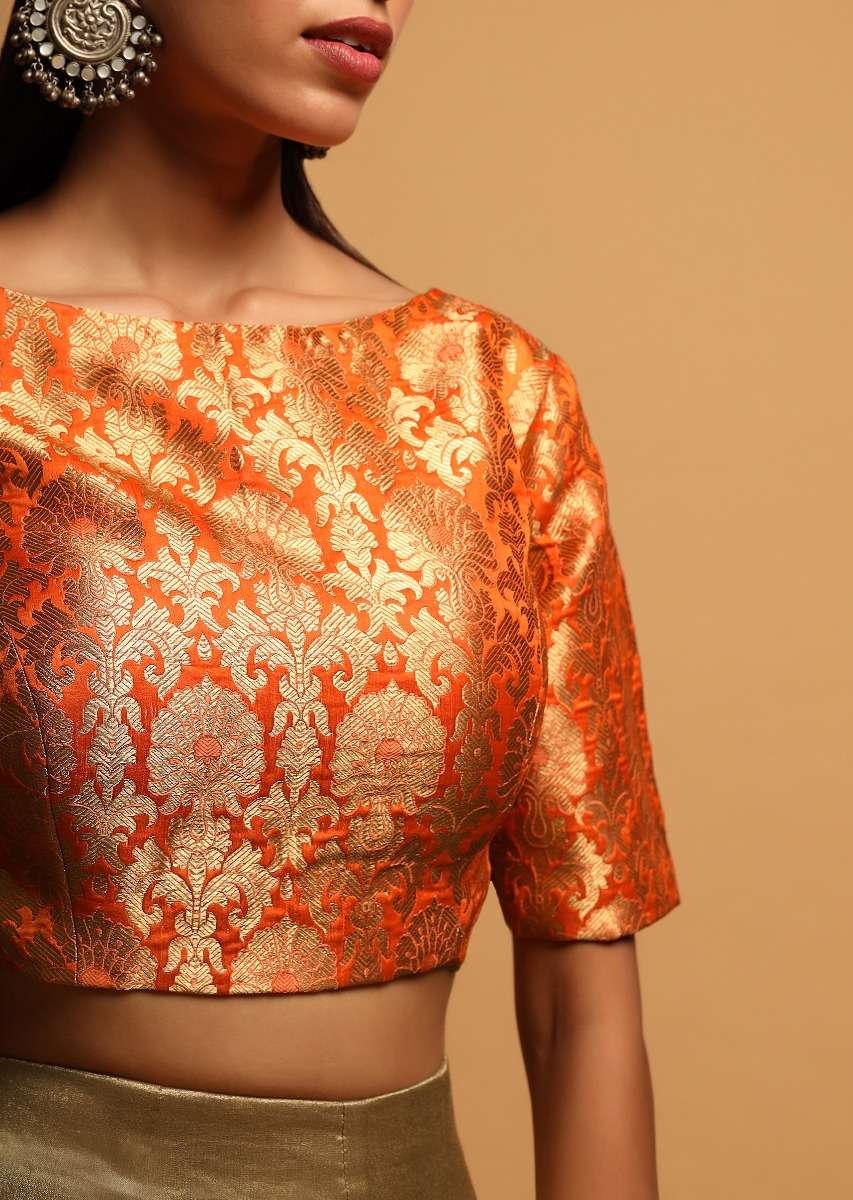 tangerine-orange-blouse-in-brocade-silk-with-woven-floral-jaal-and-34th-sleeves-online-kalki-fashion-m001459180y-sg33914_5_398678be-ea38-49c1-9bdb-82c413238dfd.jpg