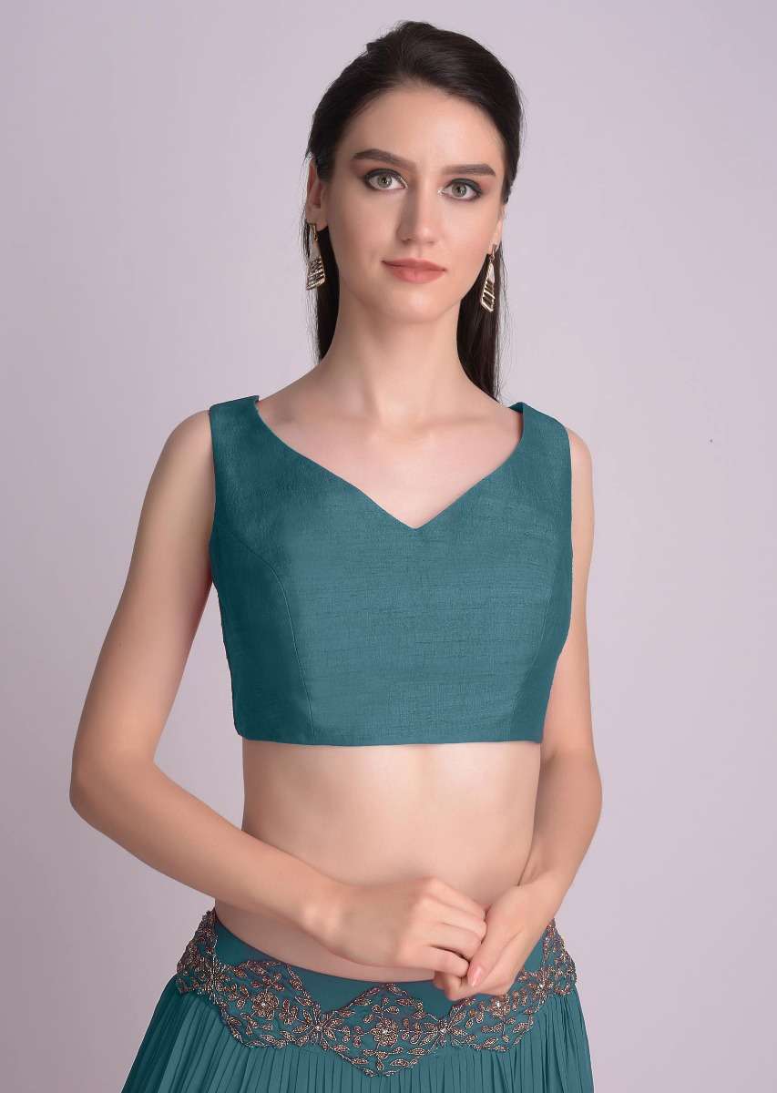 teal-blue-sleeveless-blouse-with-double-tie-up-tassel-dori-at-the-back-online-kalki-fashion-m001509617y-sg31211_3_fa0352f6-2d98-430b-b425-69a72e4ae9b5.jpg
