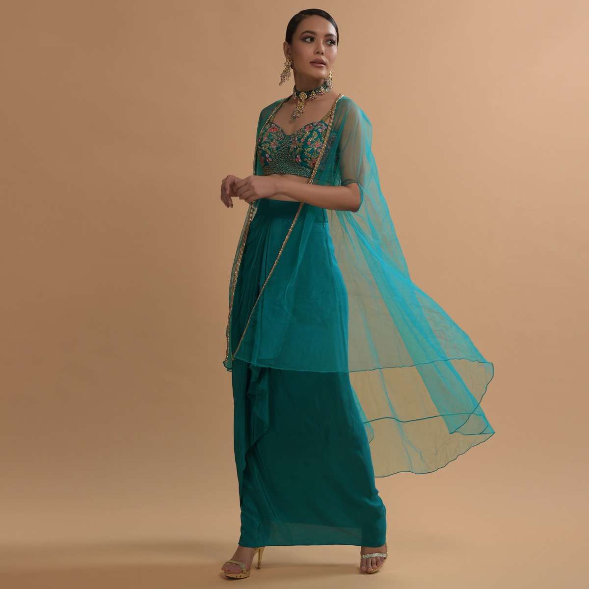 teal-drape-skirt-and-crop-top-with-matching-cape-and-colorful-resham-embroidered-spring-blooms-online-kalki-fashion-sg47165_18_82f2901d-a852-4ec5-ba8f-c1c46a85c56f.jpg