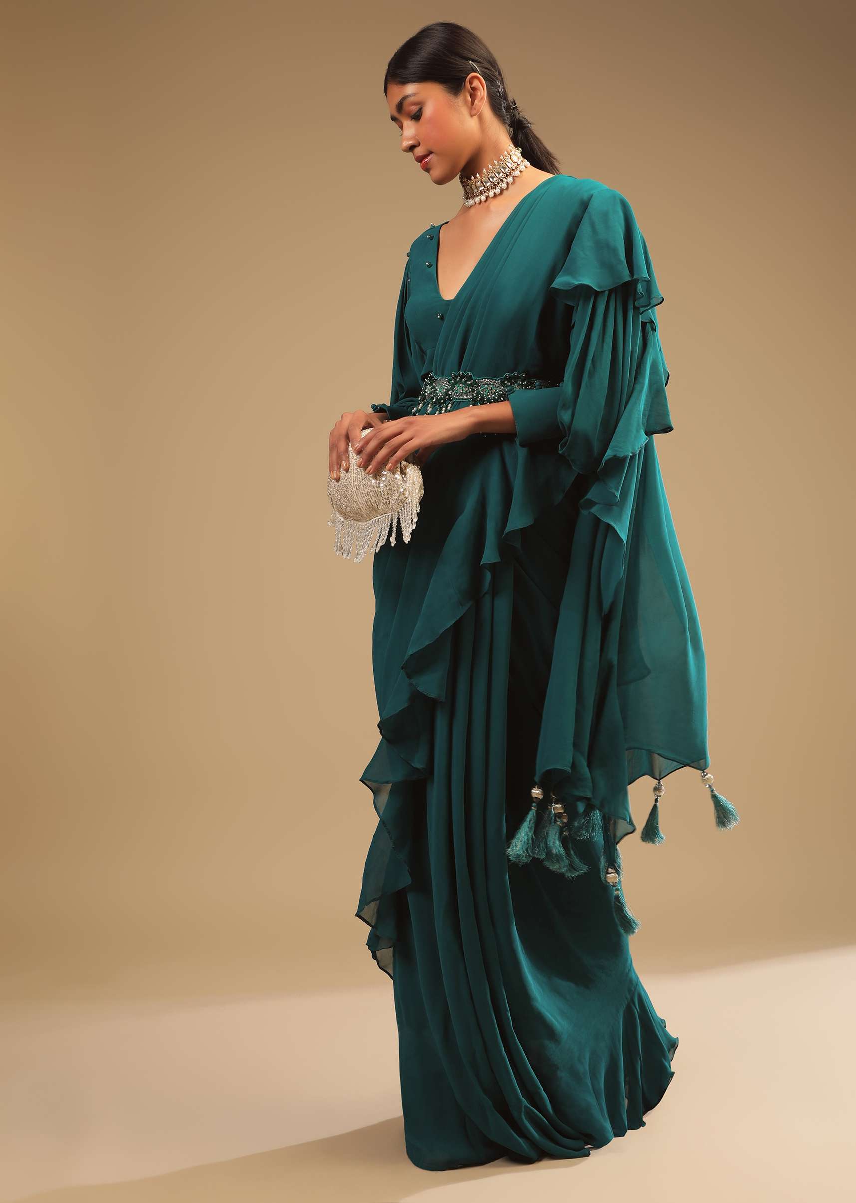 teal_blue_saree_in_georgette_with_ruffle_frill_bishop_sleeves_crop_top_and_a_chunky_embroidered_belt_online_-_kalki_fashion_45_1_5b79eae2-1087-42d7-92fc-7fe80aa6bb1a.jpg