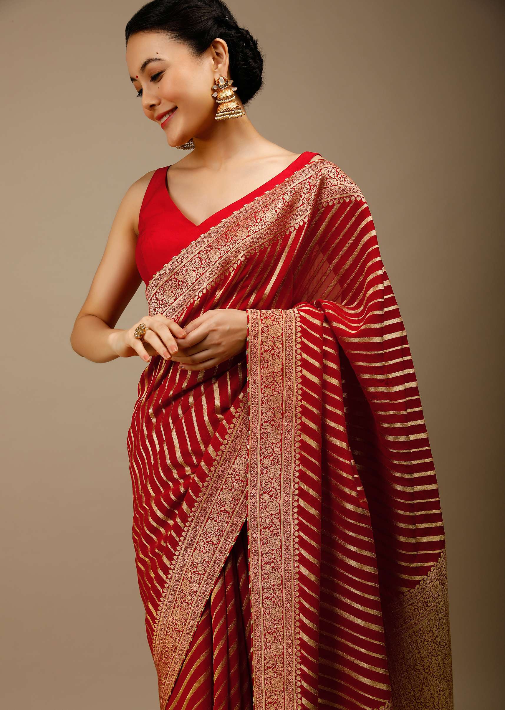 tomato-red-saree-in-georgette-with-brocade-woven-diagonal-stripes-and-floral-border-online-kalki-fashion-j004pf1081y-sg70051_4_e56cc177-6f30-4462-b244-d020a83c11dd.jpg