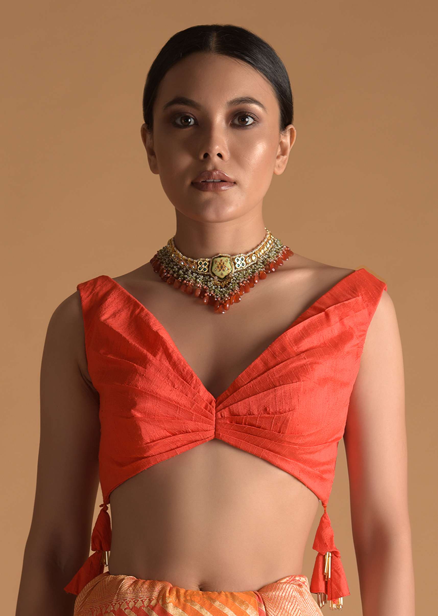 vermillion_orange_blouse_in_raw_silk_with_pleat_details_on_the_front_and_back_along_with_tassels_on_the_sides_online_-_kalki_fashion_3_8623bf12-751f-4b4c-8053-774af3873fe7.jpg