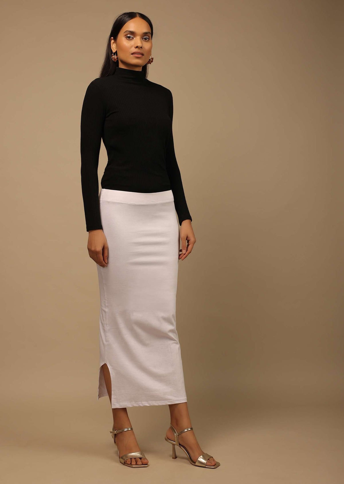white_shapewear_saree_petticoat_in_cotton_lycra_with_elastic_waistband_and_slit_4_c2c86773-52d2-41ca-9c66-d52d49f9926a.jpg