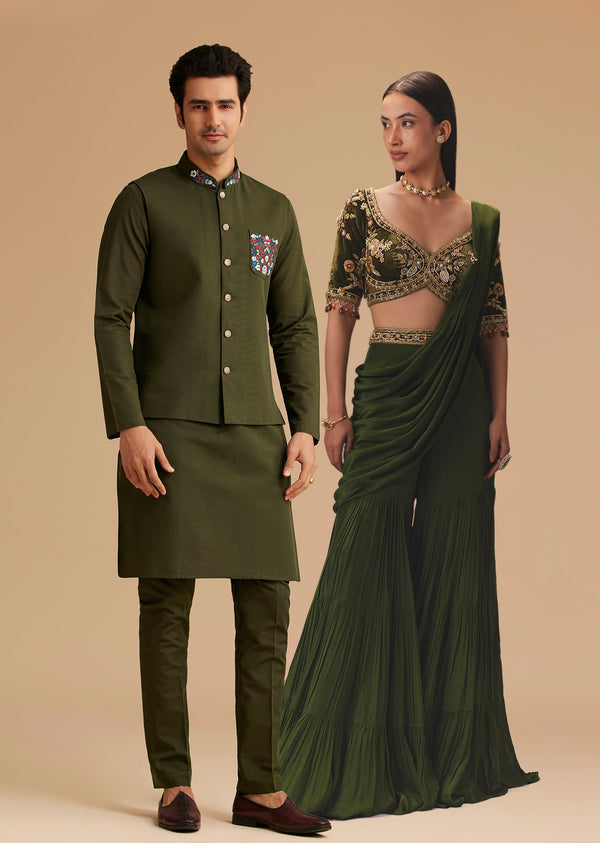 Coordinated Festive Couple Set – Seaweed Green Hand-Embroidered Draped Pallu Sharara for Her And Green Cotton Kurta Set with Embroidered Pocket & Collar for Him