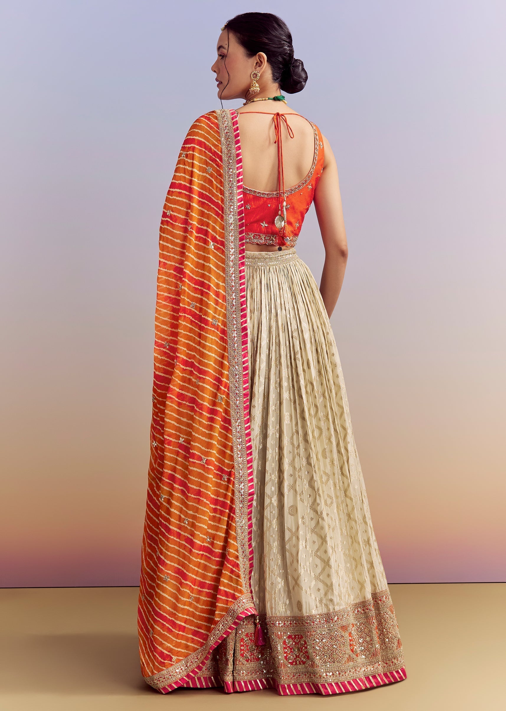 Orange_Brocade_Silk_Bridesmaid_Lehenga_With_Leheriya_Dupatta-sg308821-1_3.jpg