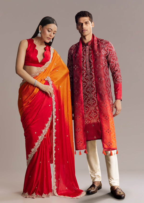 Fiery Festive Couple Set – Orange And Red Chinon Saree With Sequin And Bead Embroidery For Her And Red Ombre Kurta Set With Mirror Work For Him