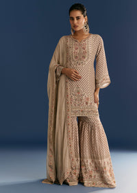 beige-crepe-printed-kurta-sharara-with-dupatta-and-potli-bag-sg305955-1_9d80c0a3-407e-4200-86d9-a39676a137b9.jpg