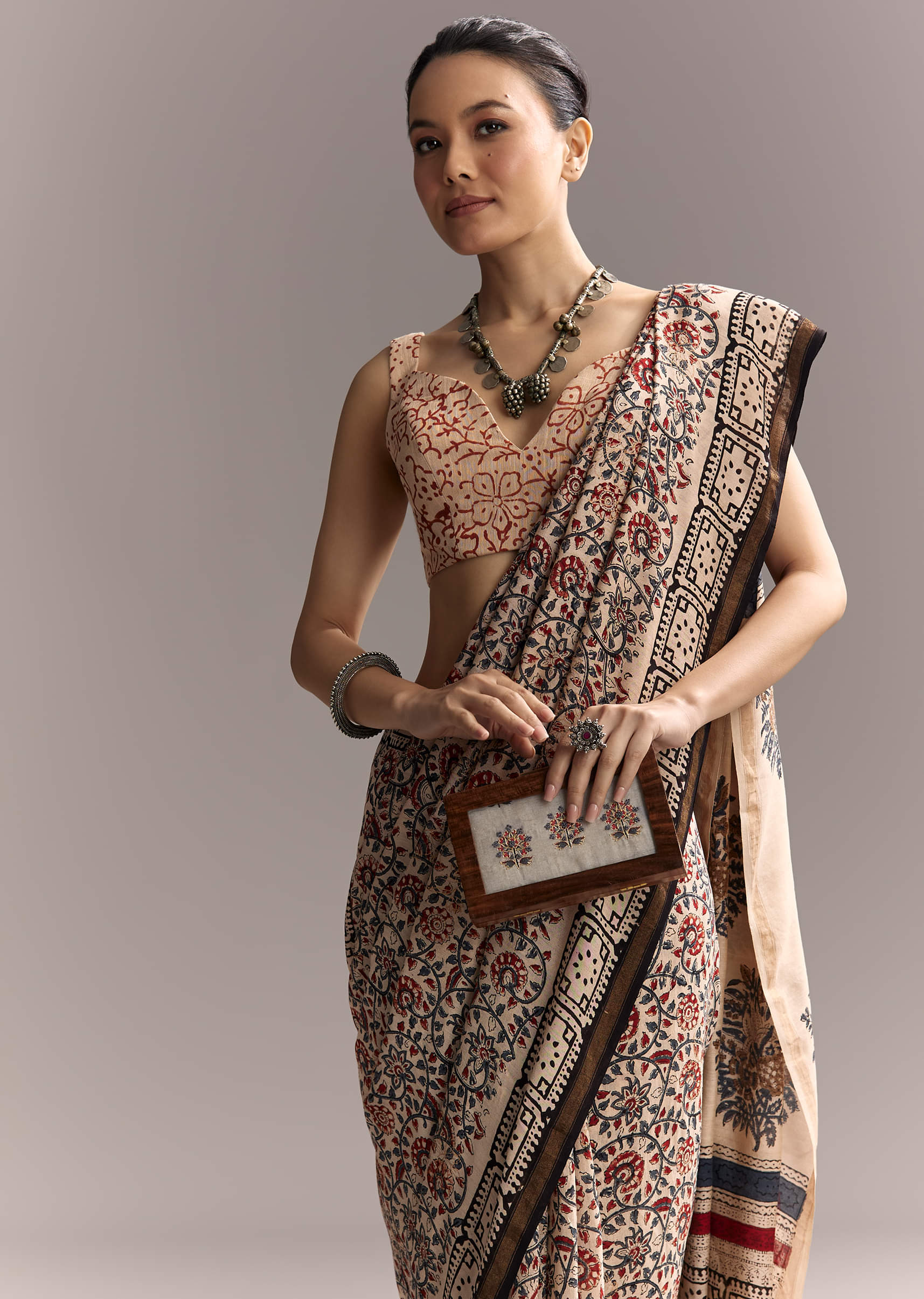 beige-linen-saree-with-ajrakh-floral-print-and-black-border-sg311975-1.jpg