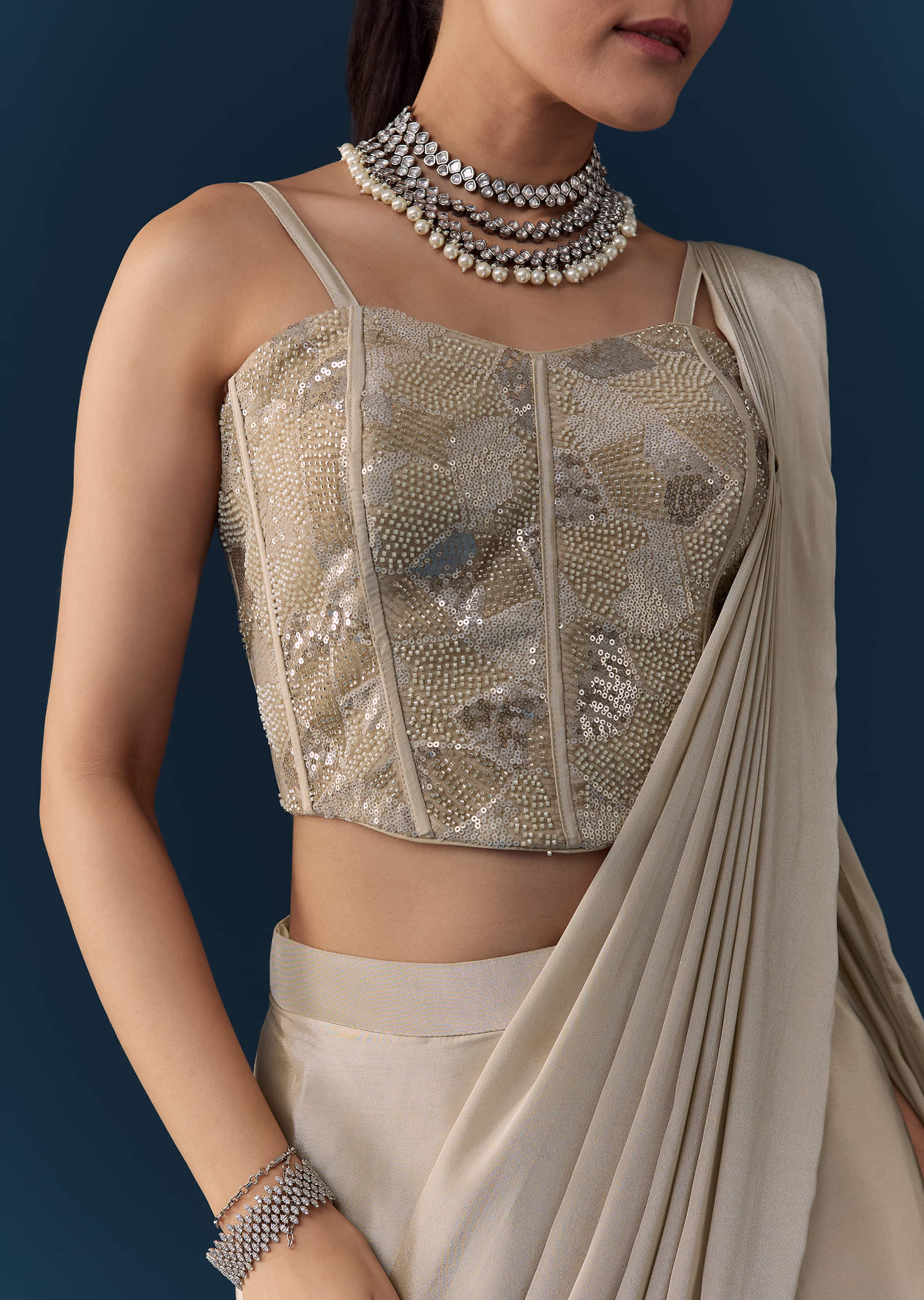 beige-pre-pleated-saree-with-sequin-corset-blouse-sg343527-2.jpg