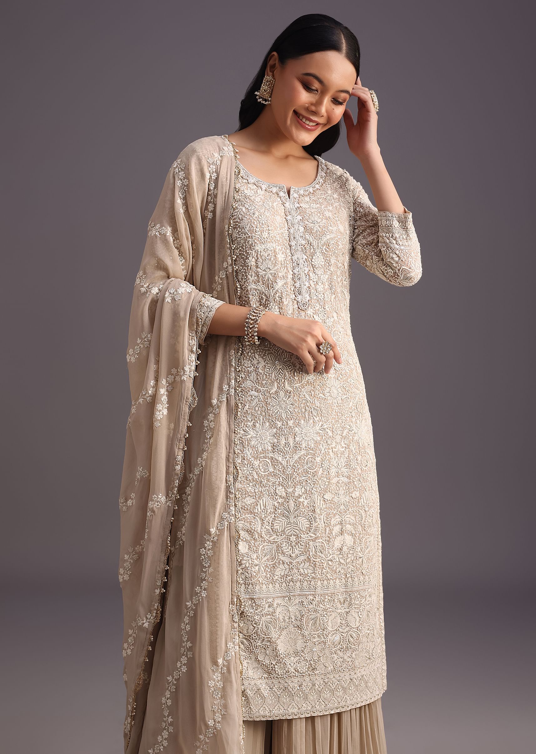 beige_lucknowi_kurti_with_flared_palazzo_and_resham-sg270543_1_6334b353-372d-4a29-a4ee-b4e6d43d85b8.jpg