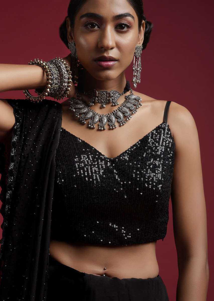 black-blouse-in-sequins-fabric-with-strap-sleeves-and-v-neckline-online_-kalki-fashion-m001bldy40y-sg57016_4__1_71dfd003-2833-48ca-9bea-87a70469fcd9.jpg