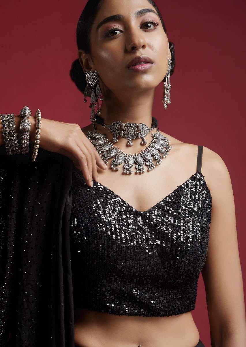 black-blouse-in-sequins-fabric-with-strap-sleeves-and-v-neckline-online_-kalki-fashion-m001bldy40y-sg57016_6__1_ab0bcd92-8ac5-4b96-bc8e-cc7f6fd1f7a9.jpg