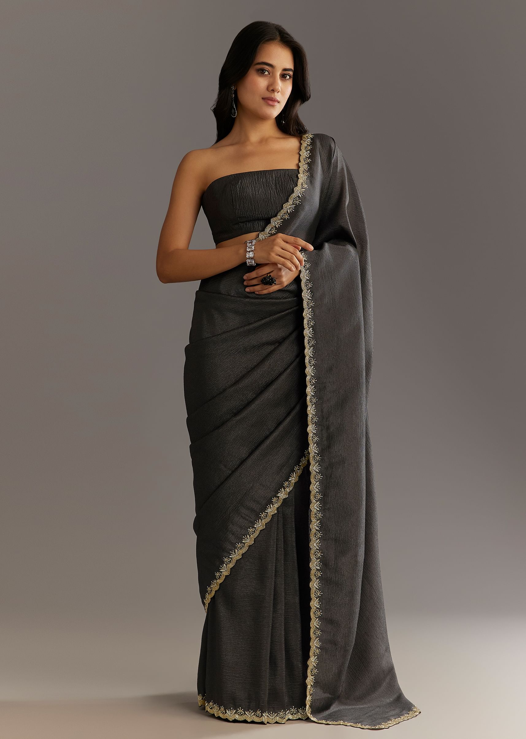 black-crushed-tissue-saree-with-scallop-embroidered-border-sg296155-1_7922844c-af5e-404c-9b9c-2ef5ee0d6456.jpg
