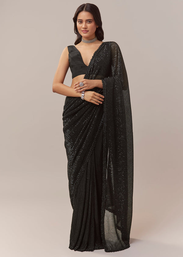 Black Net Saree With Linear Sequins And Hand Embroidered Border