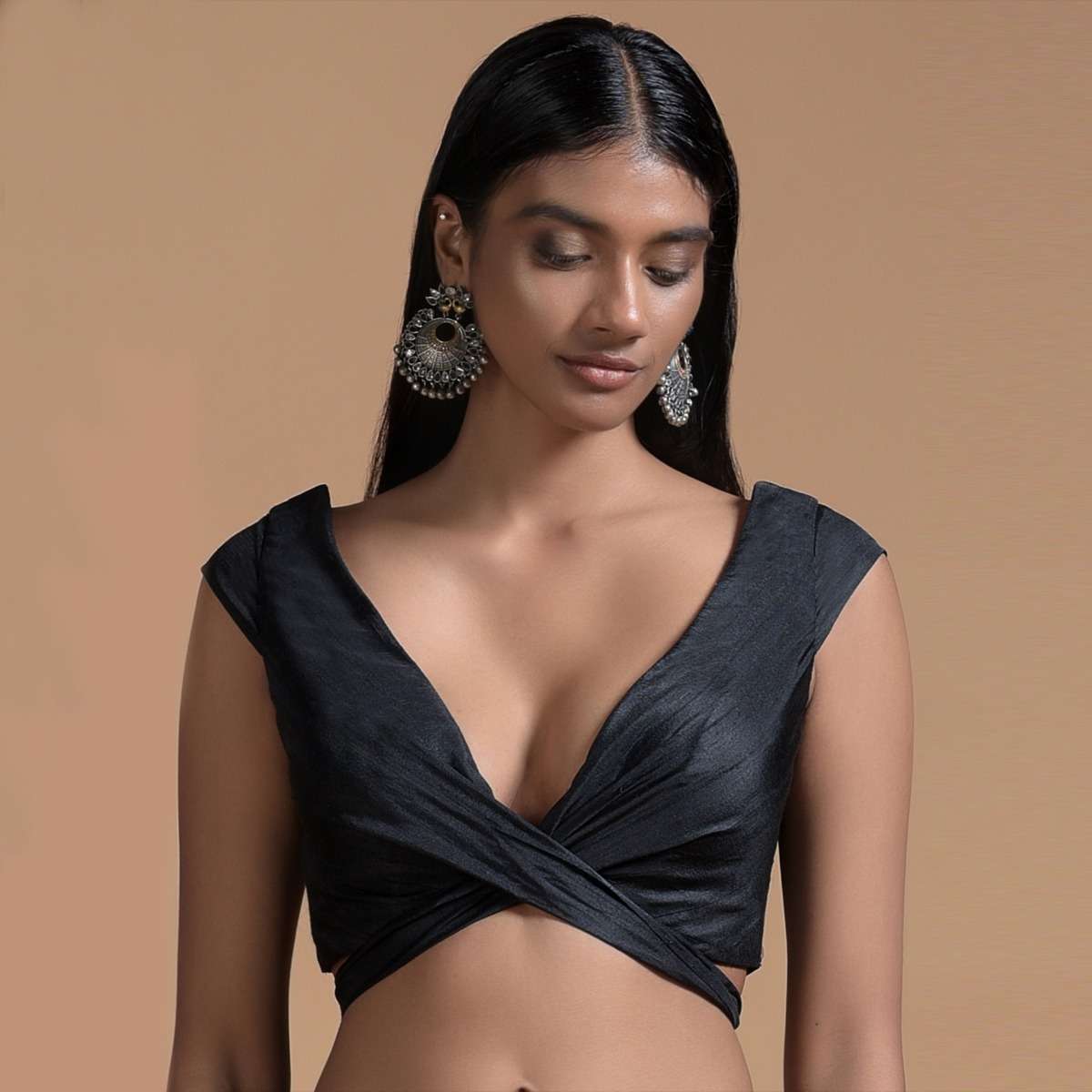 black-sleeveless-blouse-in-raw-silk-with-wrap-around-tie-up-and-plunging-neckline-online-kalki-fashion-m001blat321y-sg48315_3_69b88adb-35c9-4f07-89c8-6576a35b9c6f.jpg