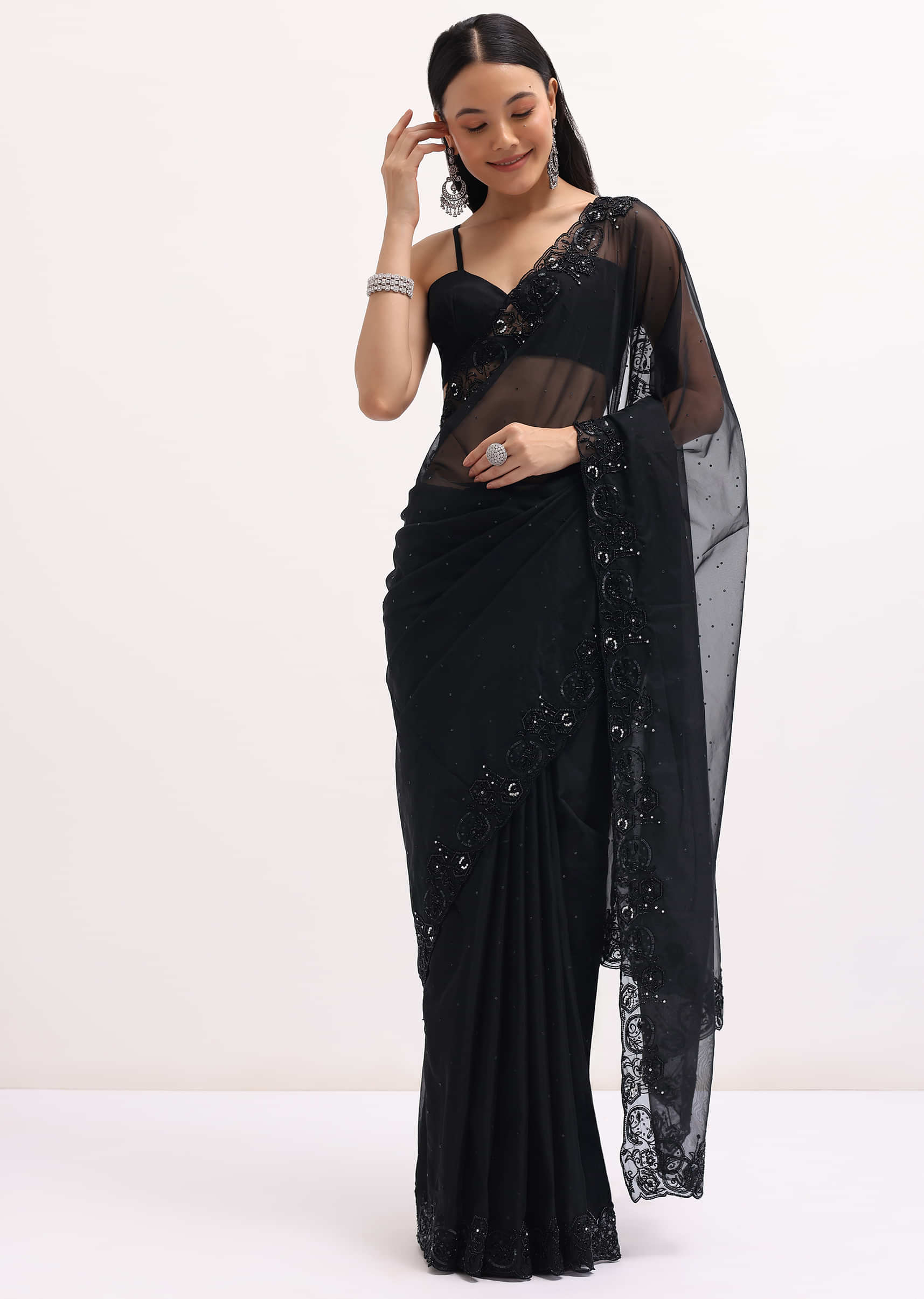 black_embroidered_organza_saree_with_unstitched_blouse-sg220477_9_5e44698c-1368-44b1-b386-8aff324a9b72.jpg