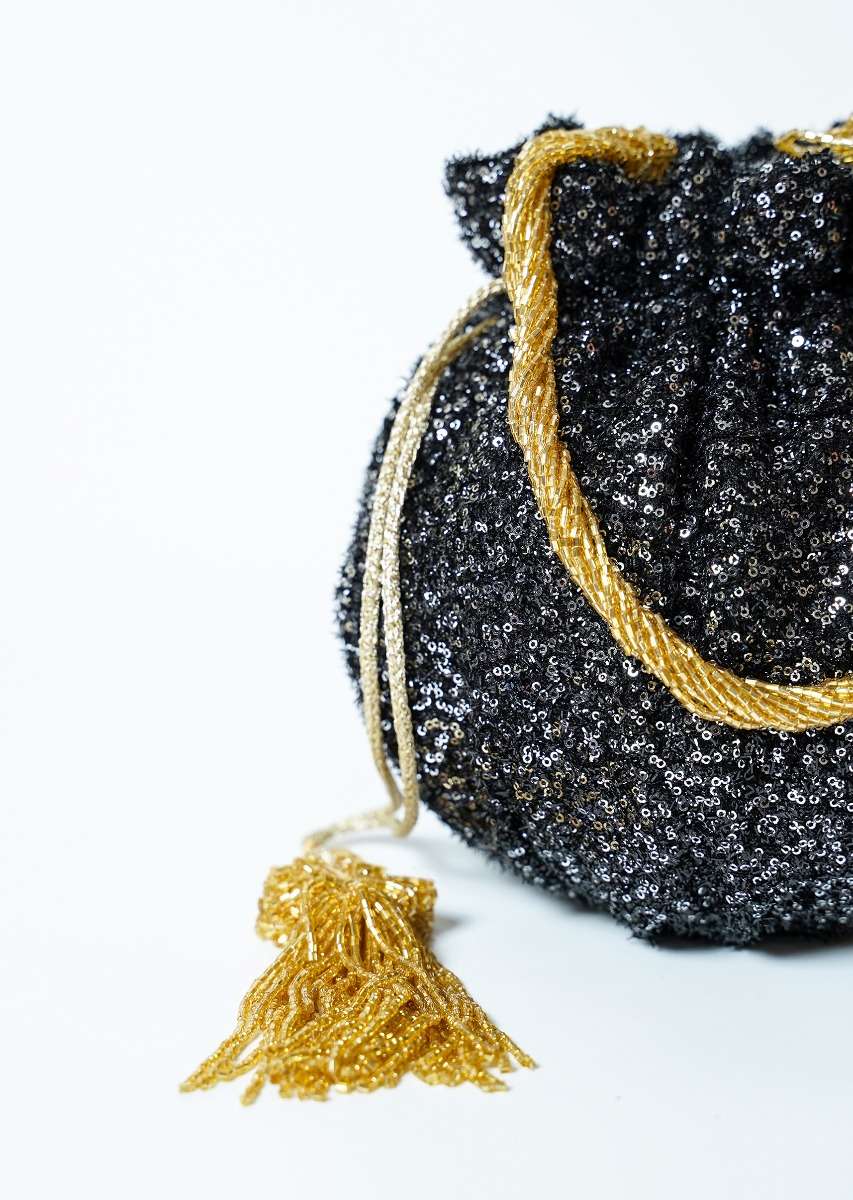 black_potli_bag_in_sequins_fabric_with_cut_dana_tassels_and_handle_by_solasta_2_04f1be77-5fd1-48e4-92f8-20eaa49180a8.jpg