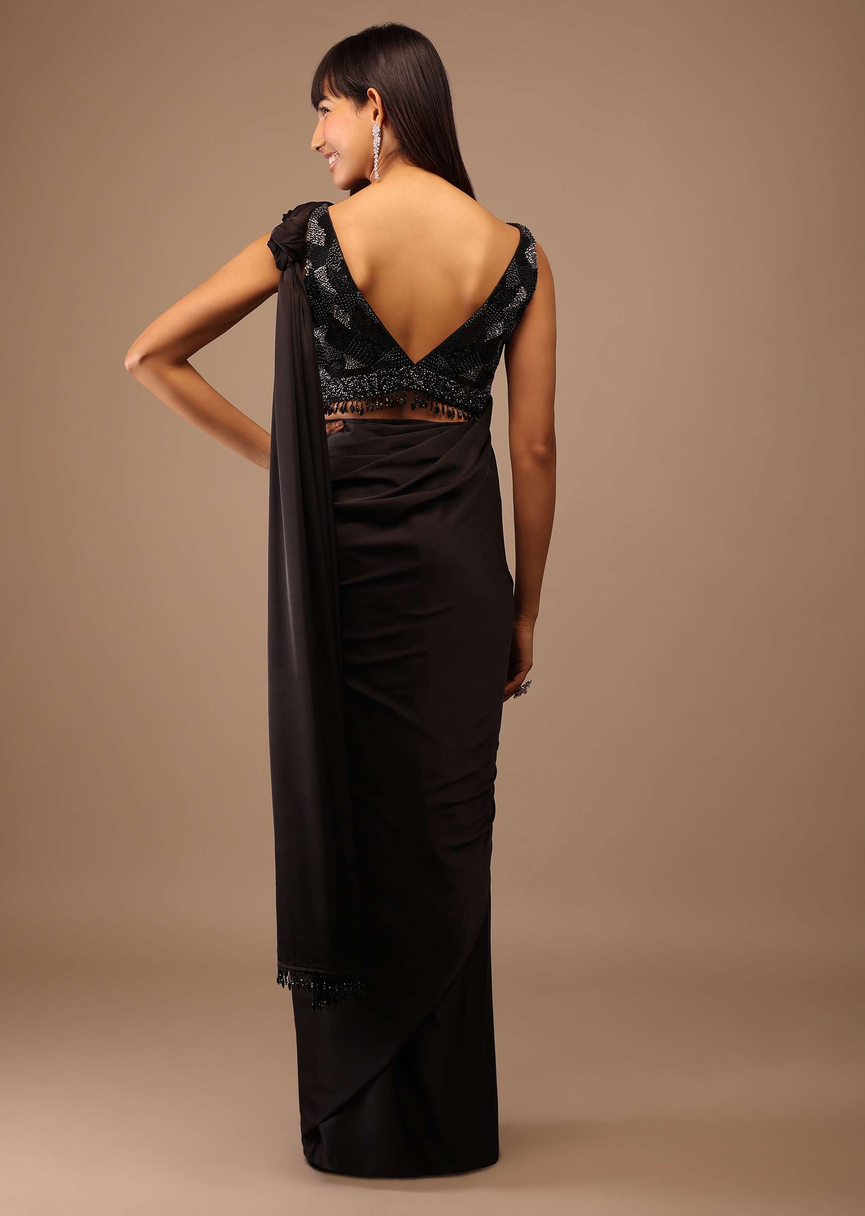 black_satin_saree_with_hand_embroidered_blouse_with_fringes_on_1_8064a6c9-7717-43f4-b006-718886c9fe45.jpg