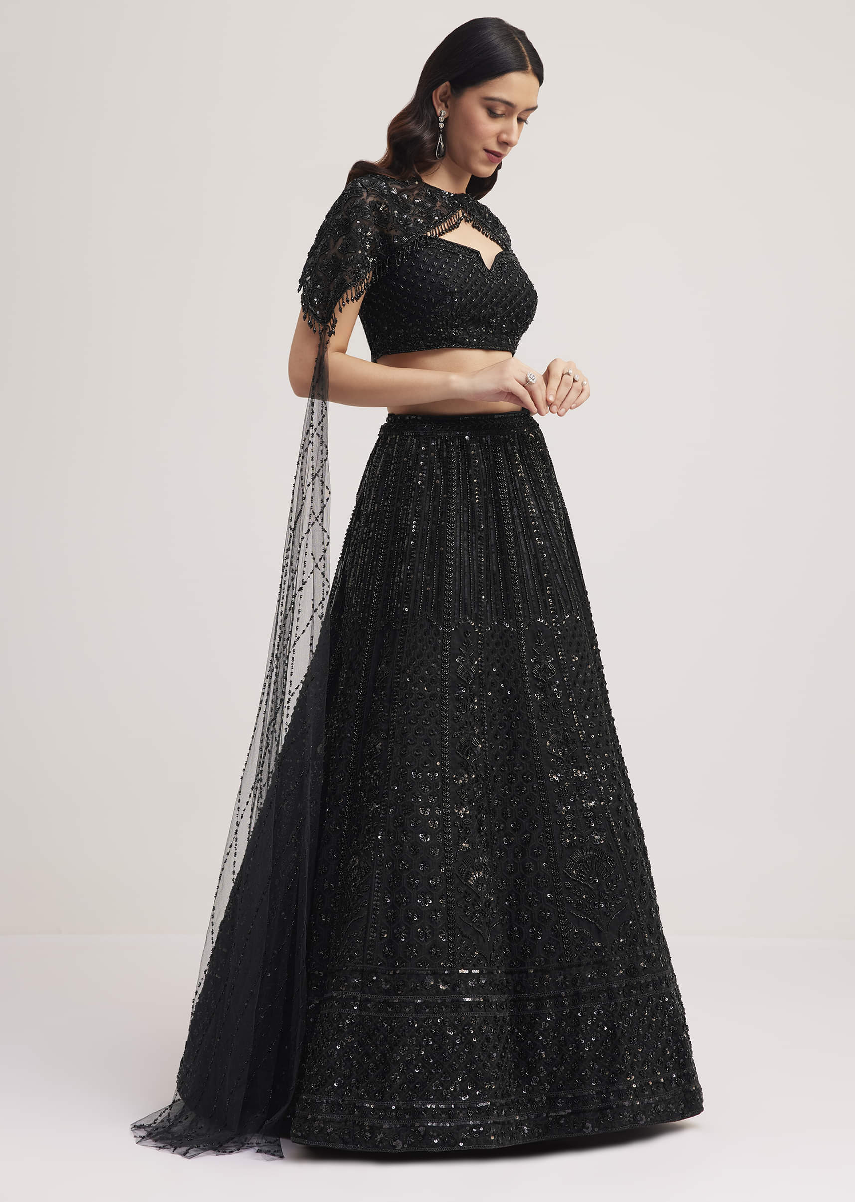 black_sequin_embellished_lehenga_choli_set_with_cape-sg286840_5_9ad23378-5a27-46a6-9f3e-f66f8f7ed311.jpg