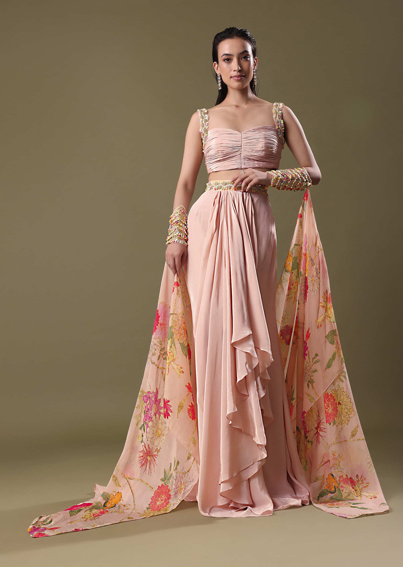 blush_peach_lehenga_with_blouse_and_cuff_cape-sg217300_1_f7f530e7-711d-44f5-bcd7-58f34fe5a88d.jpg
