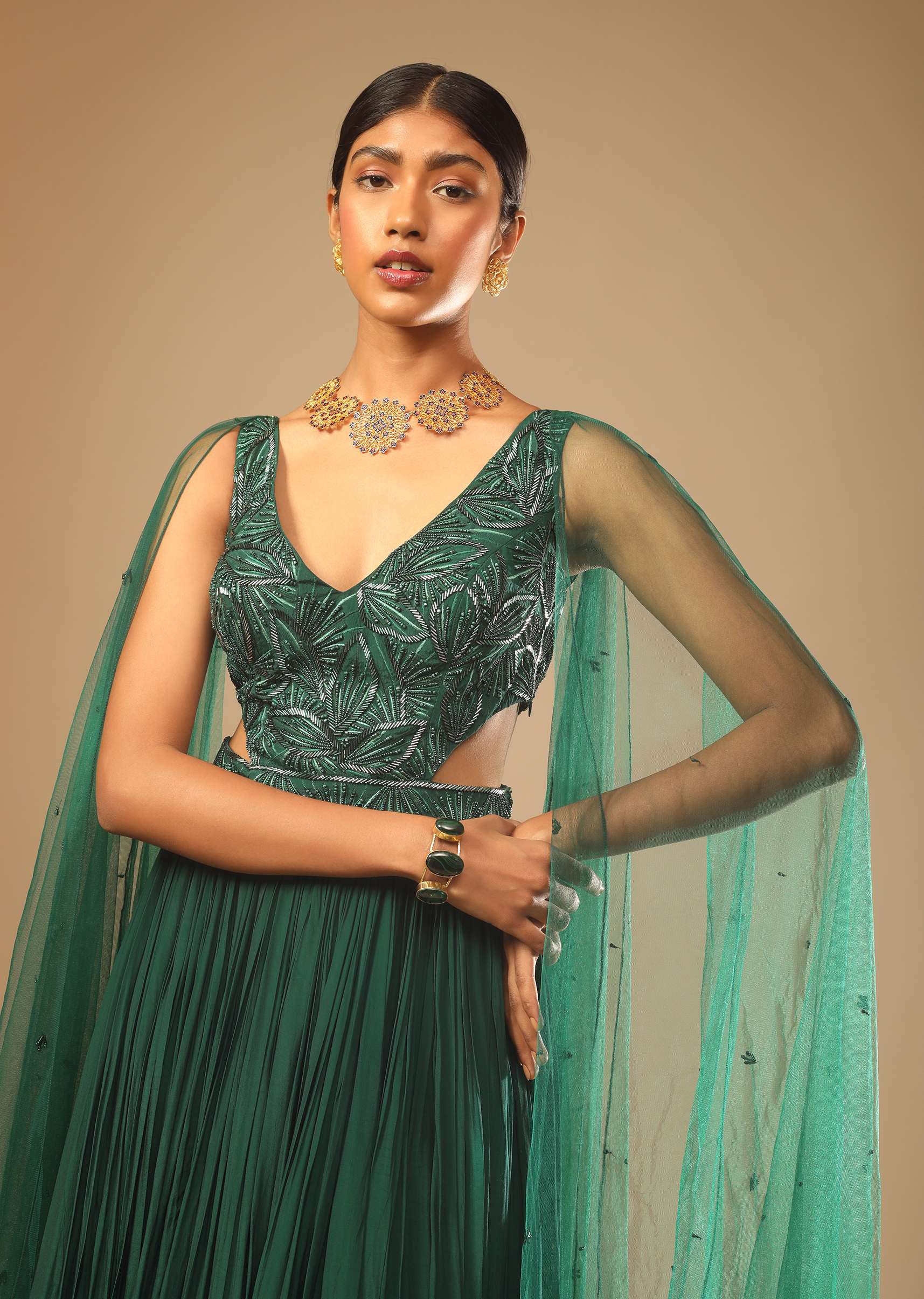 bottle-green-gown-in-crepe-with-side-cut-outs-in-the-hand-embroidered-bodice-online-kalki-fashion-m001g3011y-sg73164_4_ed706076-dab3-4e60-822d-ae1704e42c60.jpg