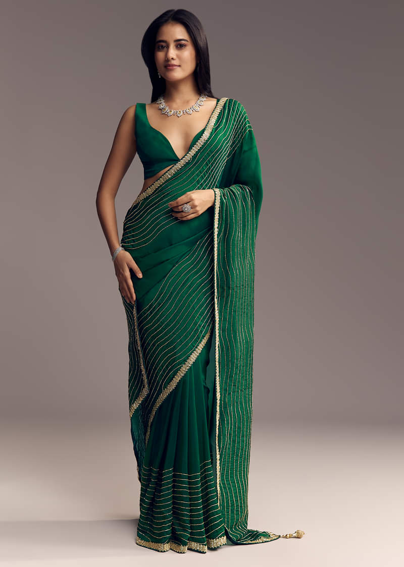 bottle-green-organza-saree-with-scalloped-cut-dana-detailing-sg317717-1_e82e35dd-edb7-4c68-a999-69eb41bacaf6.jpg