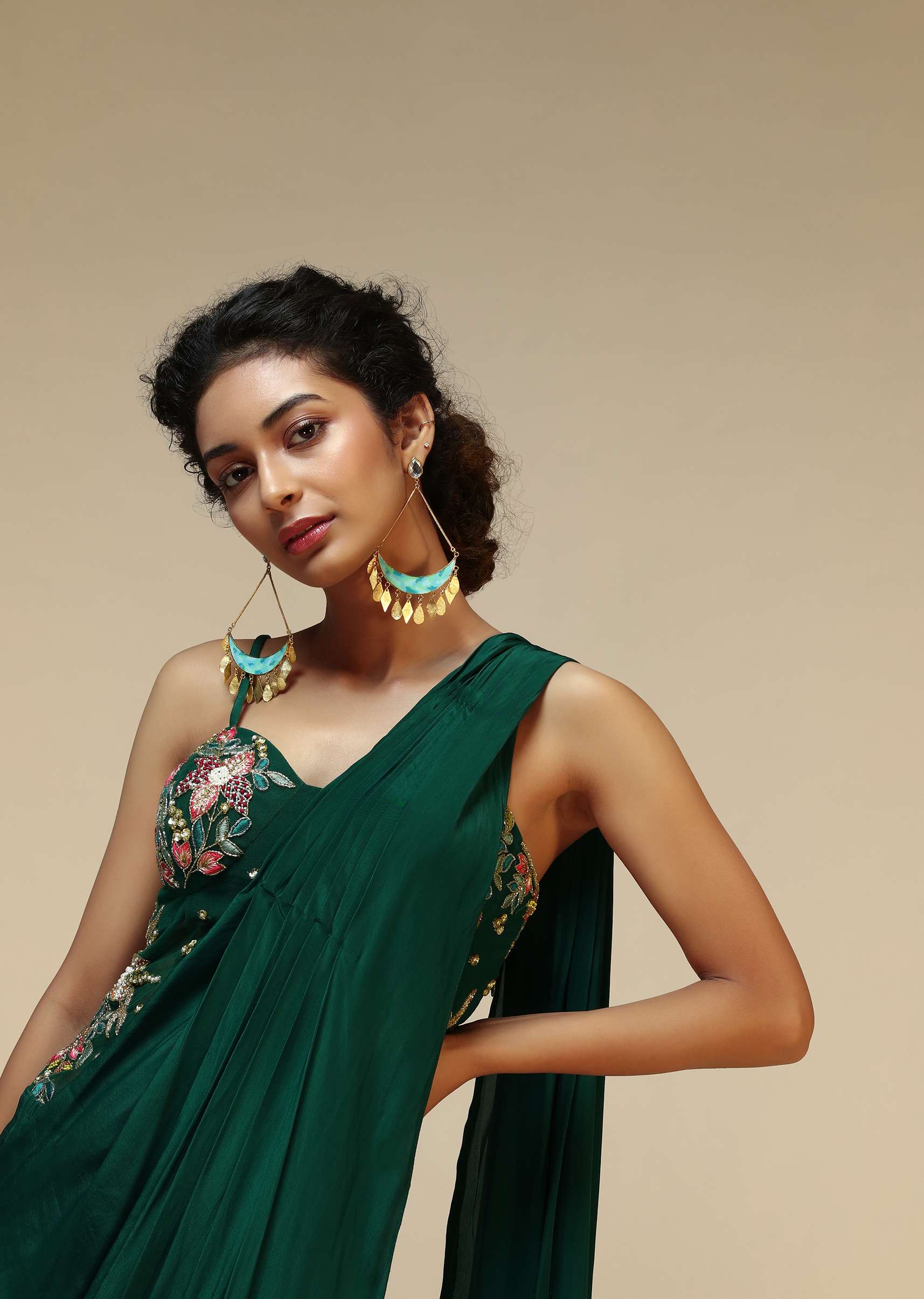 bottle-green-saree-gown-with-a-crepe-cowl-drape-and-sheer-embroidered-net-bodice-with-colorful-resham-flowers-online-kalki-fashion-m001at286y-sg53079_4_2d42c502-ca39-4a3d-be03-b993029.jpg