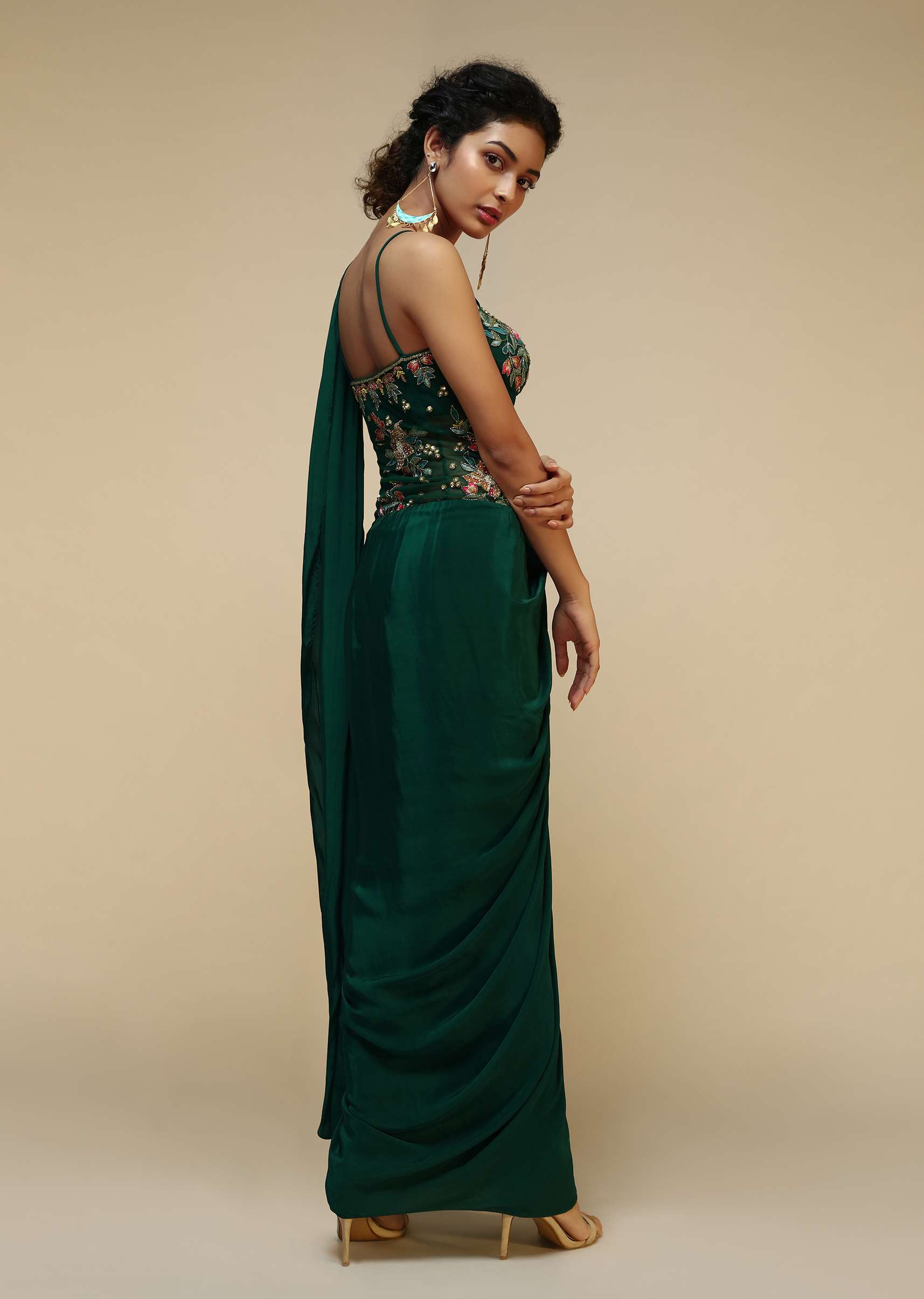bottle-green-saree-gown-with-a-crepe-cowl-drape-and-sheer-embroidered-net-bodice-with-colorful-resham-flowers-online-kalki-fashion-m001at286y-sg53079_5_e025a783-7e29-4318-af83-6c0578f.jpg