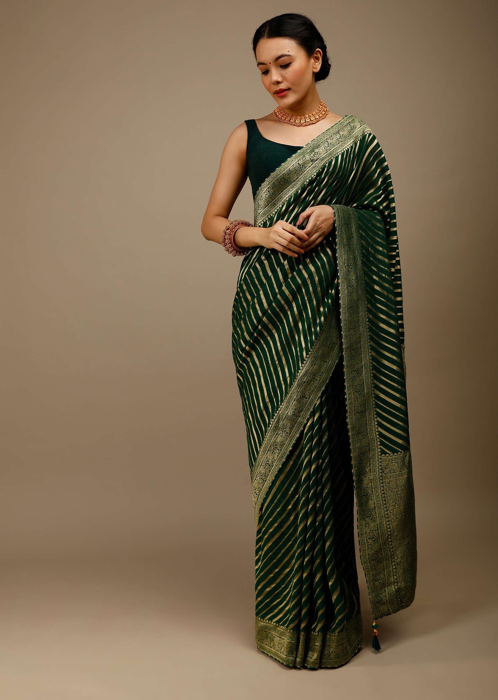 bottle-green-saree-in-georgette-with-brocade-woven-diagonal-stripes-and-floral-border-online-kalki-fashion-j004pf1081y-sg70053_2_dbd82722-e9fe-4d3e-a995-e35dd06d5e18.jpg