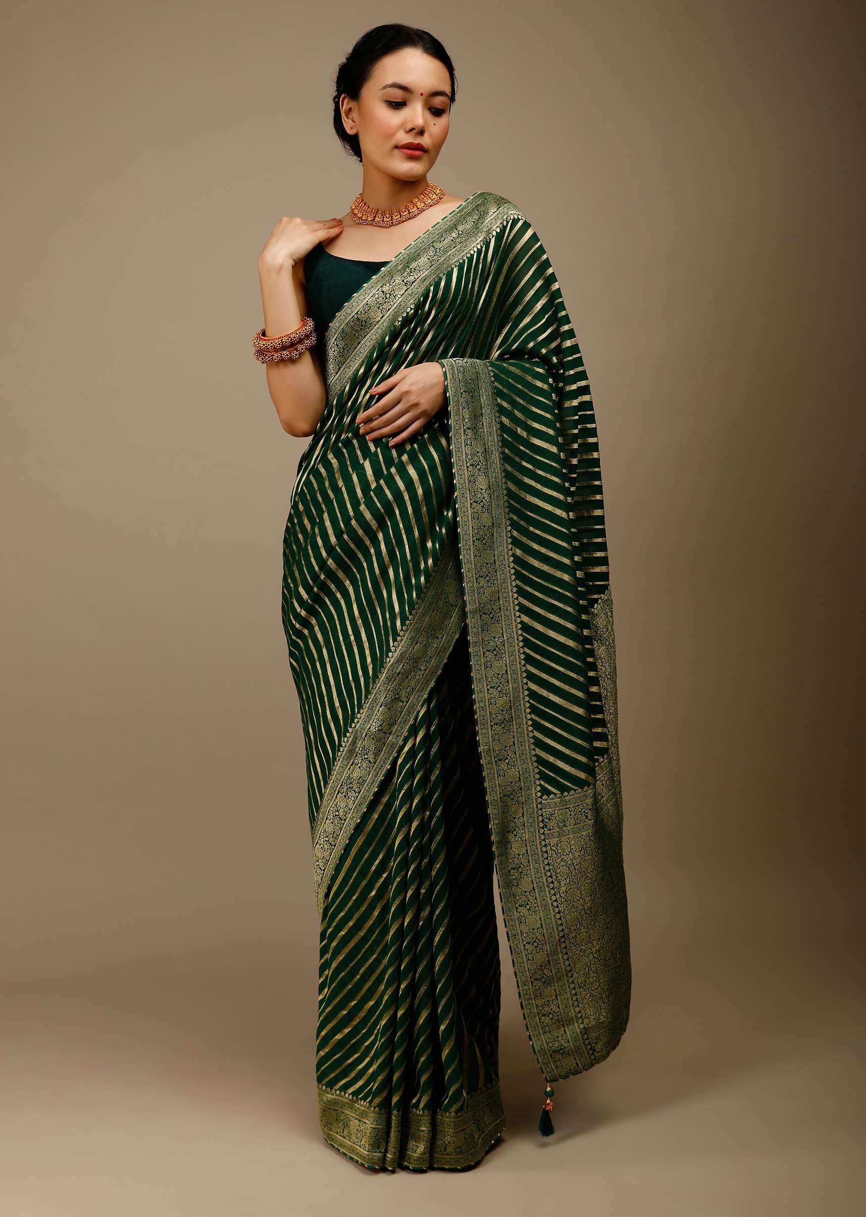 bottle-green-saree-in-georgette-with-brocade-woven-diagonal-stripes-and-floral-border-online-kalki-fashion-j004pf1081y-sg70053_7_74f0bdb2-88cc-4409-8a68-07656d7a317e.jpg