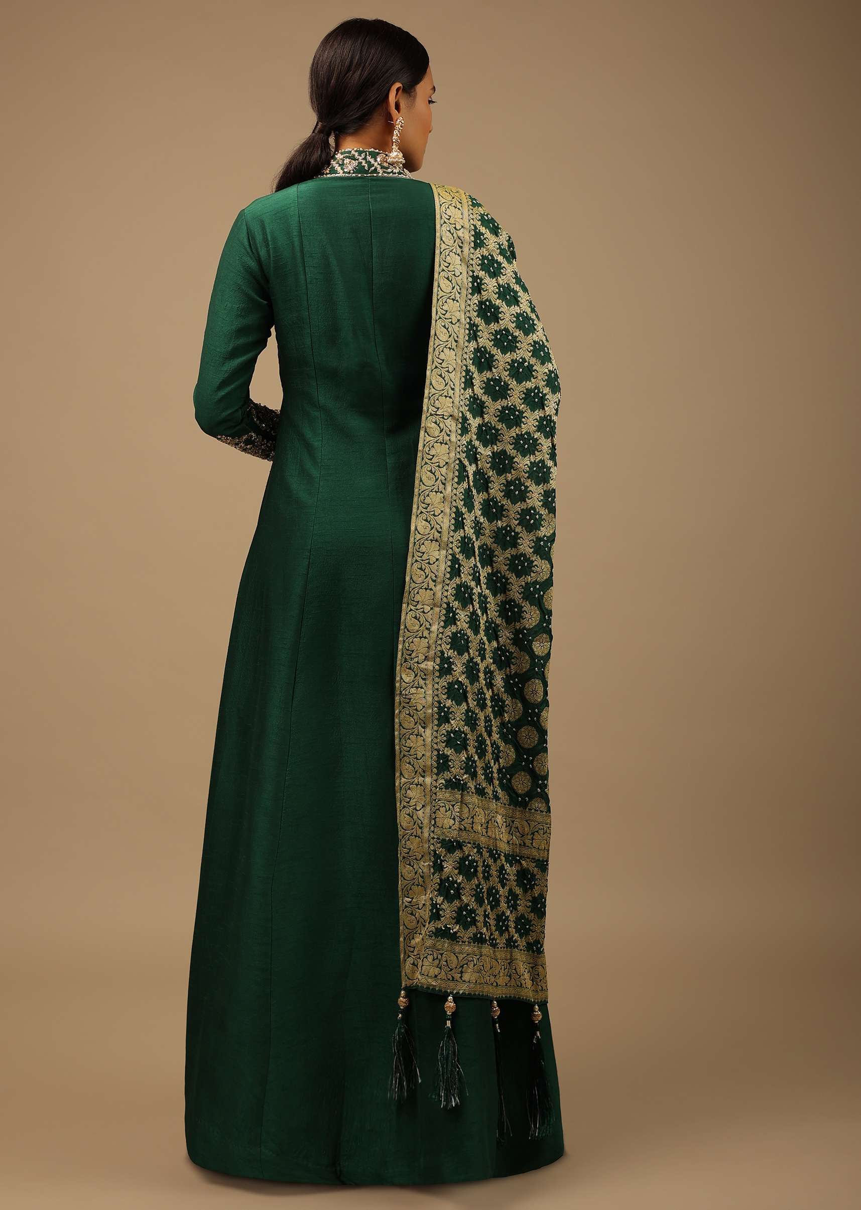 bottle_green_anarkali_suit_in_raw_silk_with_hand_embroidery_1_9acffa41-f3f1-43f8-9a1f-3e9010057792.jpg