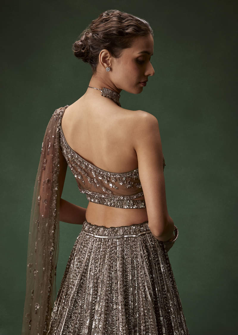 brown-one-shoulder-bridal-lehenga-set-with-all-over-sequins-sg328780-6_a1e808d4-cf9c-491c-9c41-cac4f61a18b7.jpg