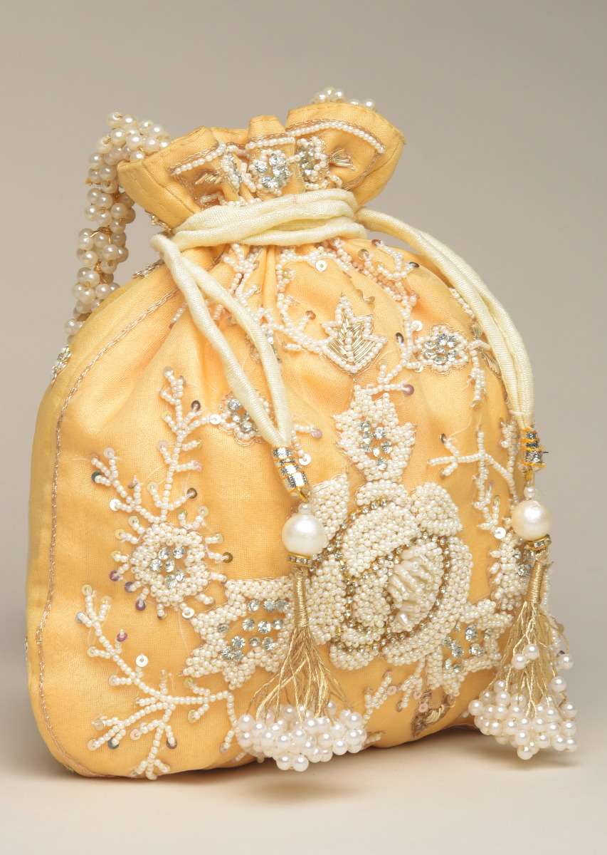 butter-yellow-potli-bag-in-raw-silk-with-moti-embroidery-in-rose-motif-and-floral-design-online-kalki-fashion-j017flowerpotliy-sg54838_5_8a6808c3-6c09-48e9-b82c-f2134bbe744c.jpg