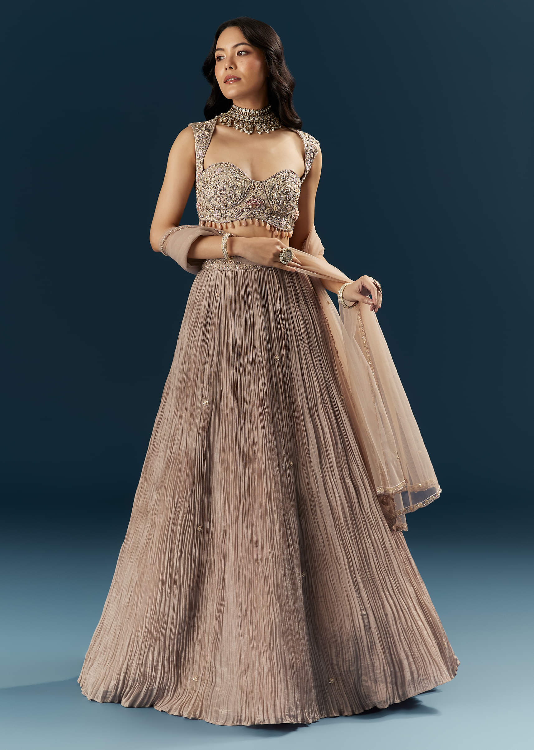 champagne-gold-organza-bridesmaid-lehenga-with-heavy-embroidery-sg339569-1.jpg