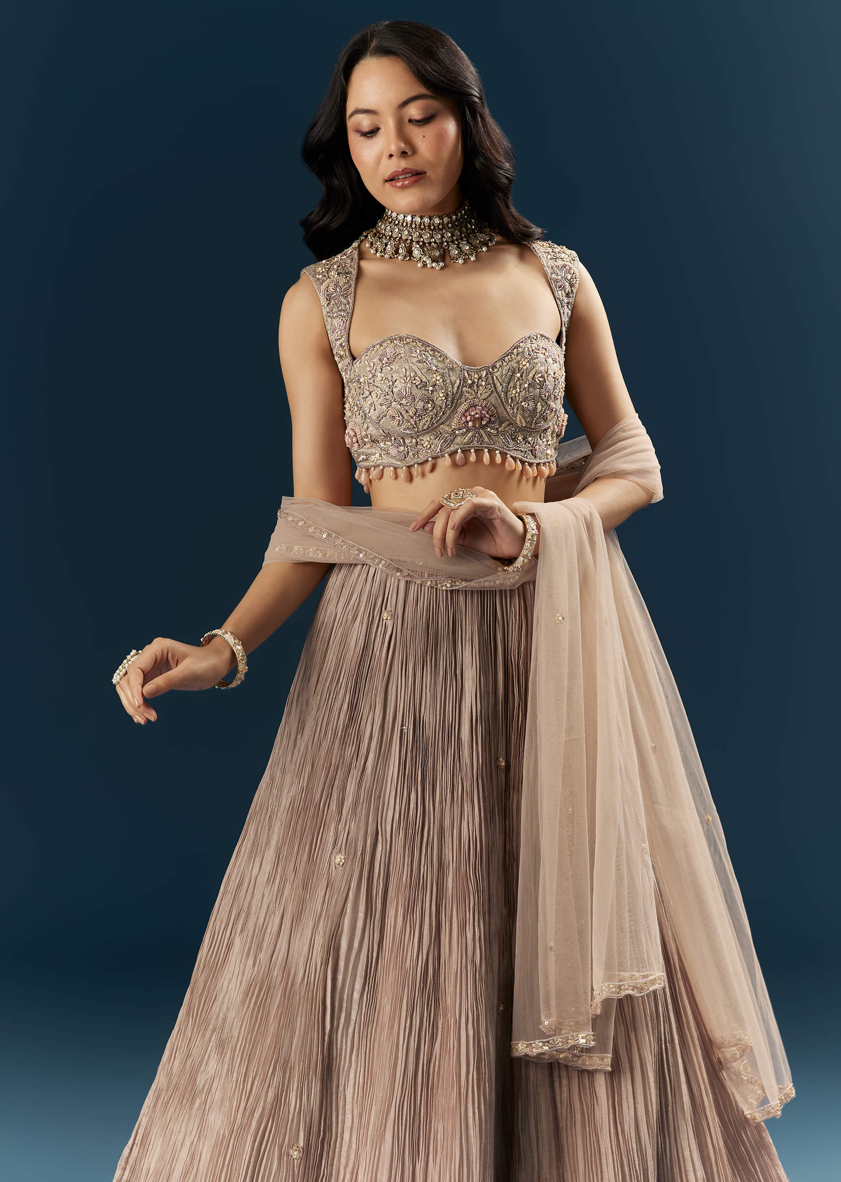 champagne-gold-organza-bridesmaid-lehenga-with-heavy-embroidery-sg339569-3.jpg