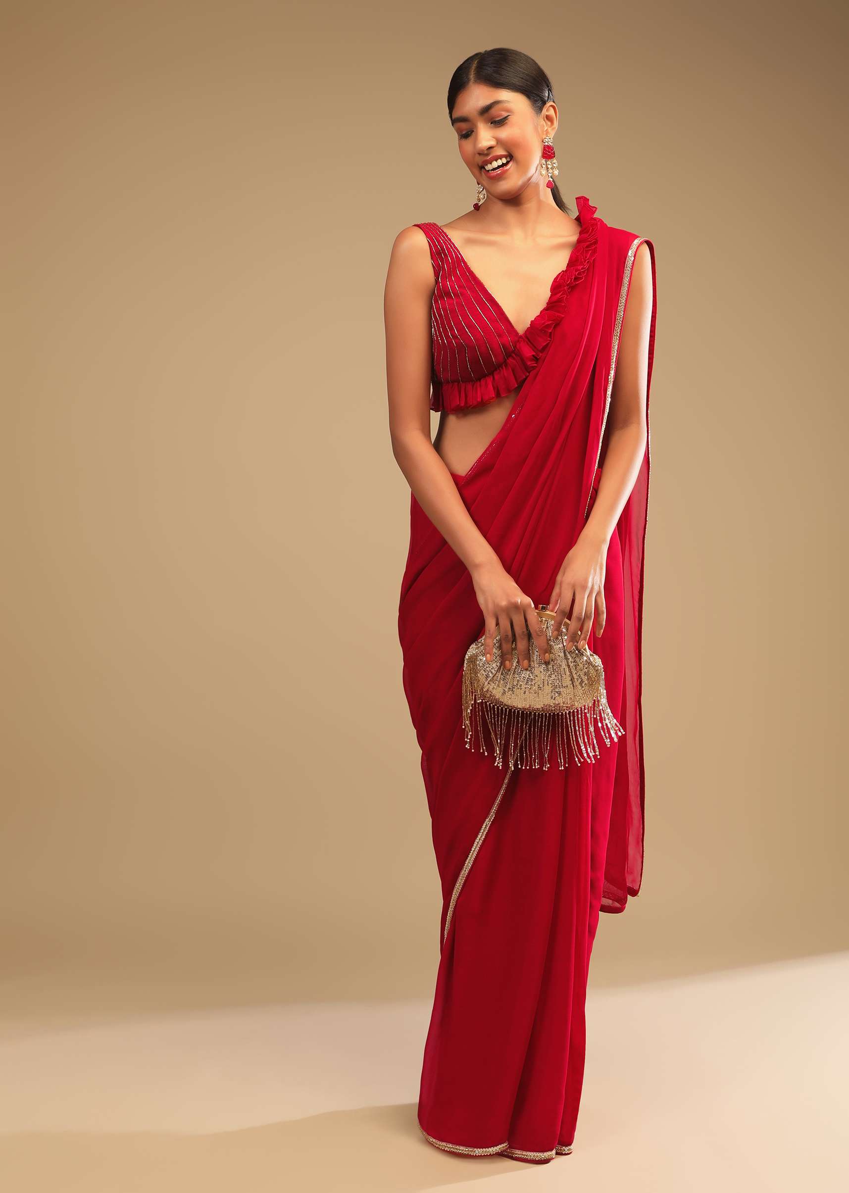 cherry-red-saree-in-georgette-with-sequins-and-cut-dana-embellished-border-and-a-ruffle-frill-adorned-crop-top-online-kalki-fashion-m001tr342y-sg64570_4_e9696d45-e6a3-4abf-a910-45d309.jpg