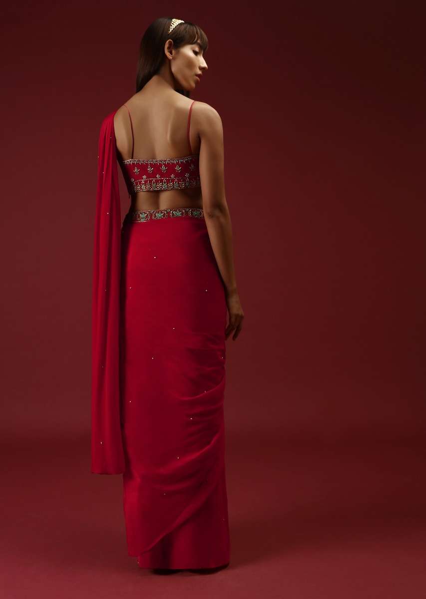 cranberry_red_ready_pleated_saree_with_a_multicolored_hand_embroidered_blouse_and_belt_online_-_kalki_fashion_6_e06eeb83-497c-4201-a873-a847cd79f8c7.jpg