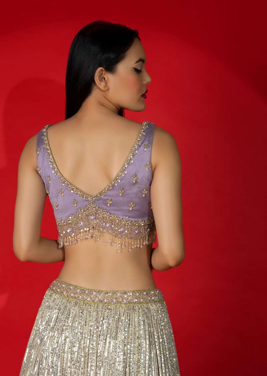 cream-and-lavender-shaded-sequins-lehenga-with-hand-embroidered-lavender-choli-and-ruffle-dupatta-online-kalki-fashion-m001ra522y-sg68390_3_cfea5c92-740c-477f-afe3-b1734b0581d4.jpg