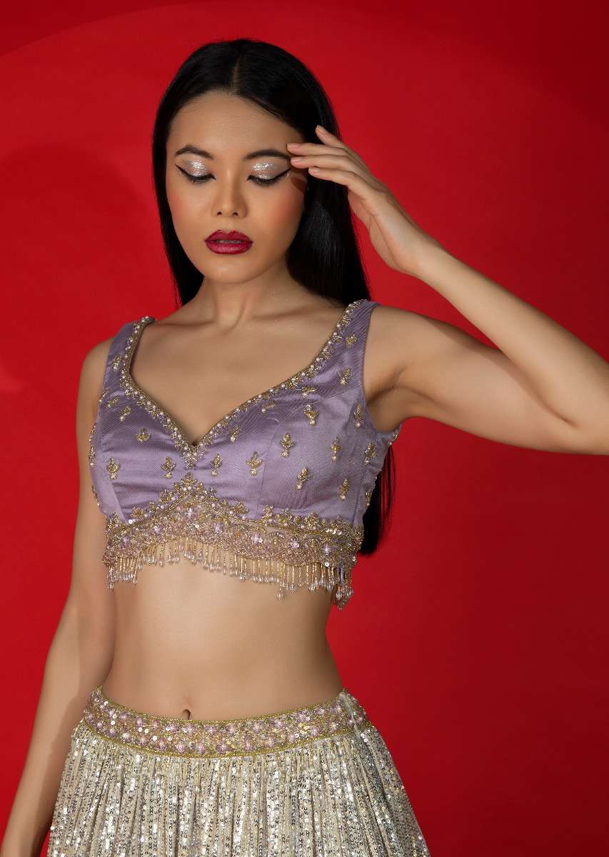 cream-and-lavender-shaded-sequins-lehenga-with-hand-embroidered-lavender-choli-and-ruffle-dupatta-online-kalki-fashion-m001ra522y-sg68390_920f8531-7015-4eac-8204-e844875b888d.jpg