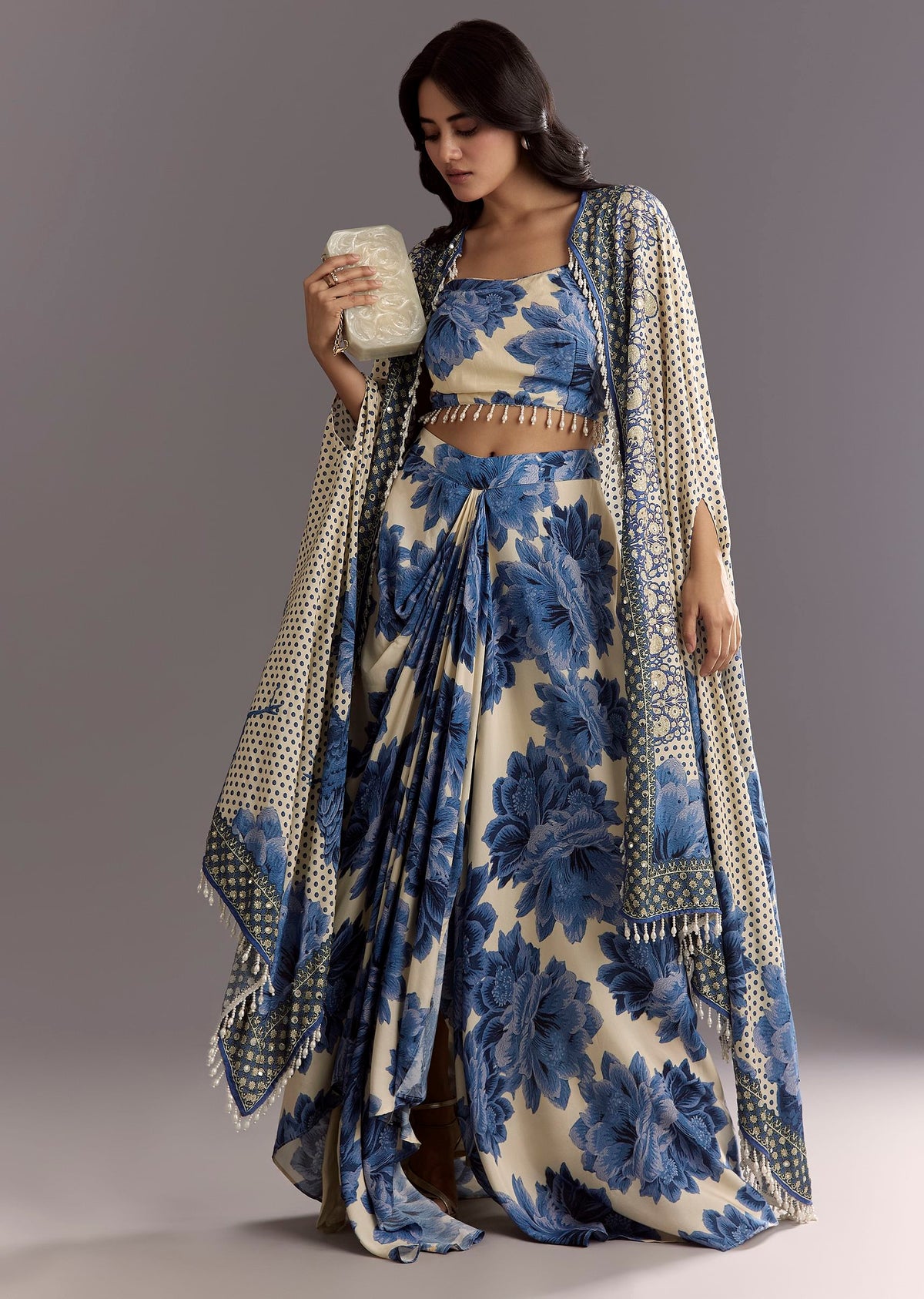 cream-blue-floral-printed-croptop-skirt-with-tassel-bordered-cape-sg308919-1_38153f3b-5319-4fa3-96d4-9a1412bfd3f3.jpg