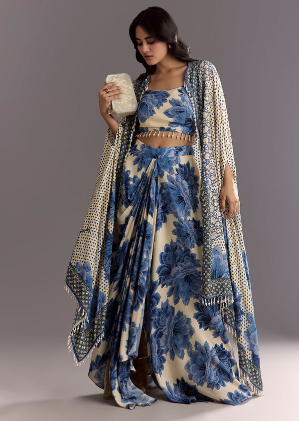 Cream Blue Floral Printed Croptop Skirt With Tassel Bordered Cape
