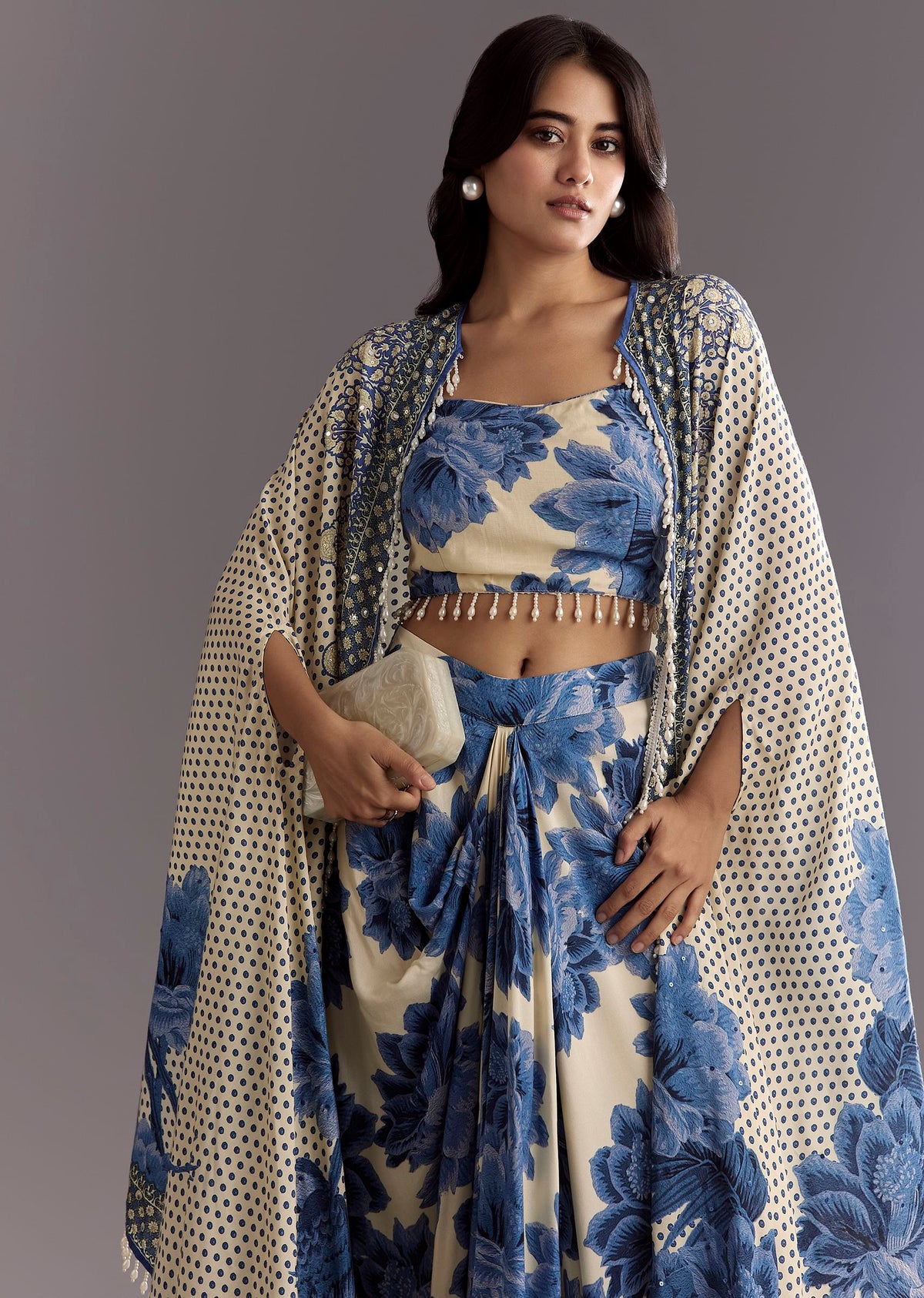 cream-blue-floral-printed-croptop-skirt-with-tassel-bordered-cape-sg308919-2_9b80b5d2-957f-4104-adbb-c67bd68e16e0.jpg