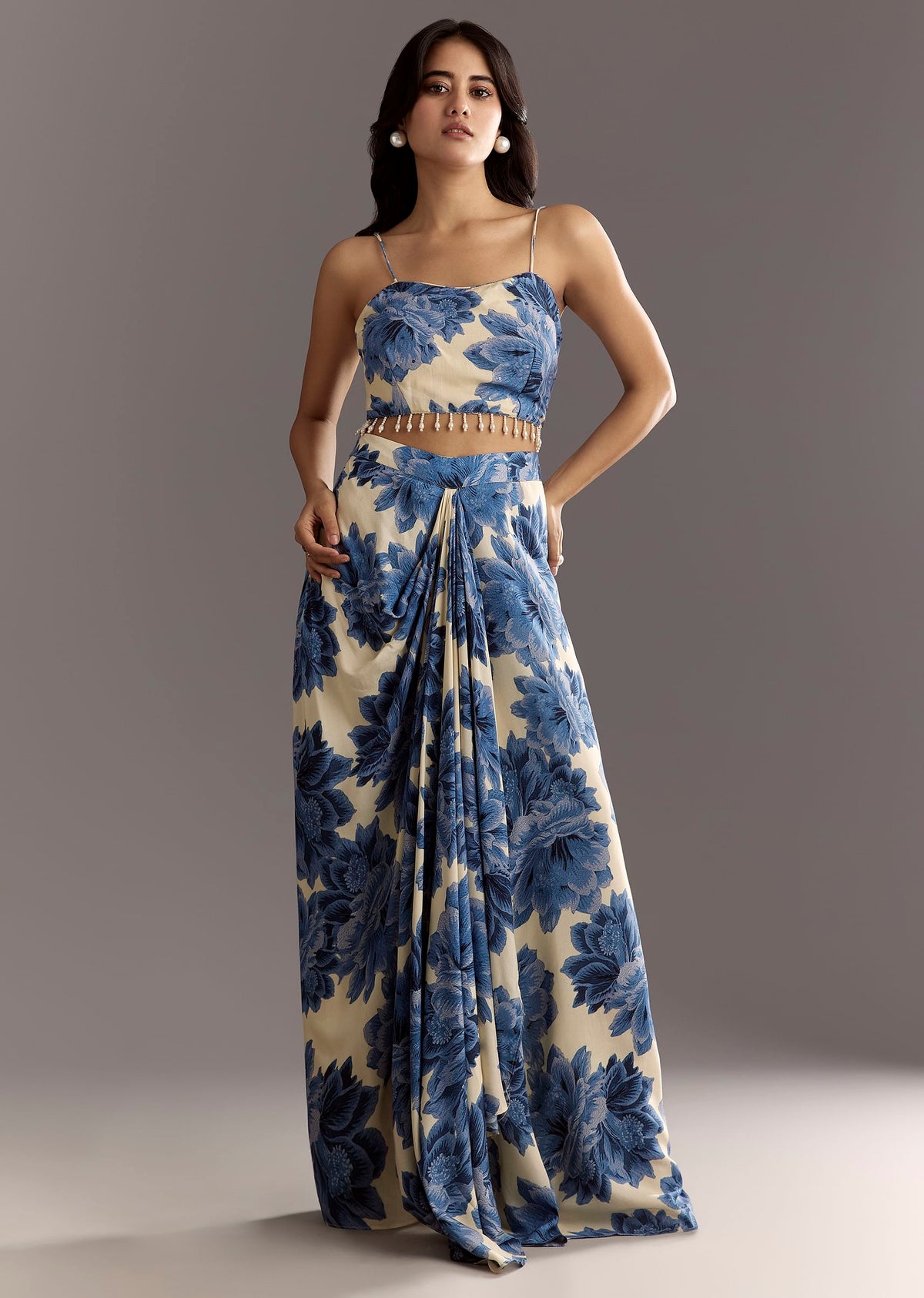 cream-blue-floral-printed-croptop-skirt-with-tassel-bordered-cape-sg308919-6_09d457dd-ac5a-48d9-acdb-f908af3eb07a.jpg