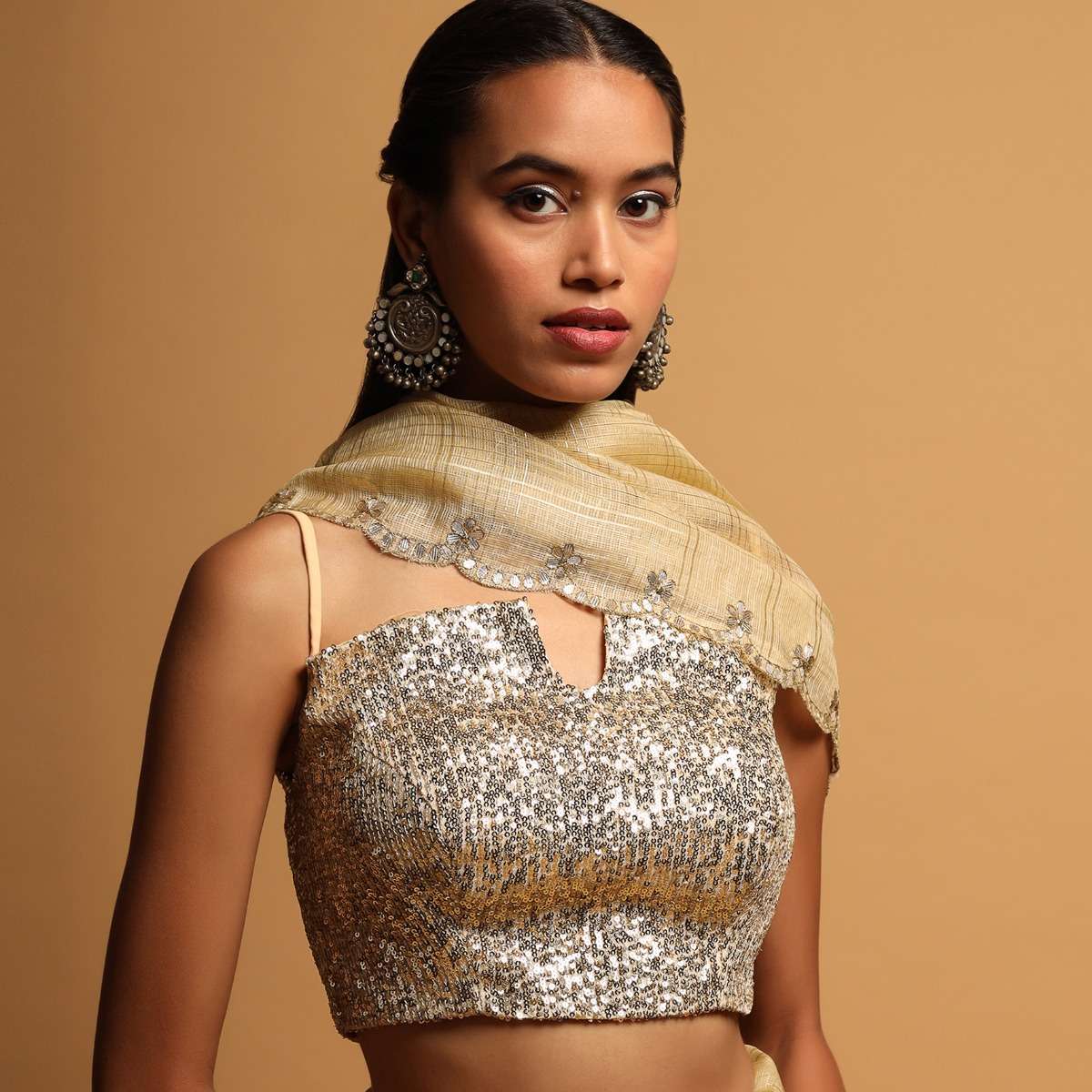 cream-gold-crop-top-in-sequins-fabric-having-a-curved-neckline-with-notch-in-the-centre-online-kalki-fashion-m001bldy76y-sg57597_3_5fc4b94b-808f-4de8-a6a0-c8fe30eec575.jpg