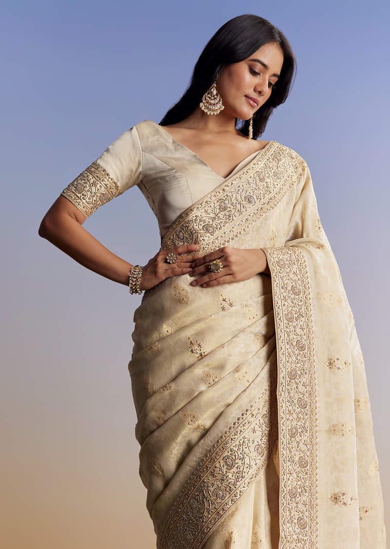 cream-jacquard-silk-saree-with-zari-brocade-and-zardosi-embellished-pallu-sg177295-1_1_a1a5a83d-4d30-4a1b-81e7-dcbd08cb2cd6.jpg