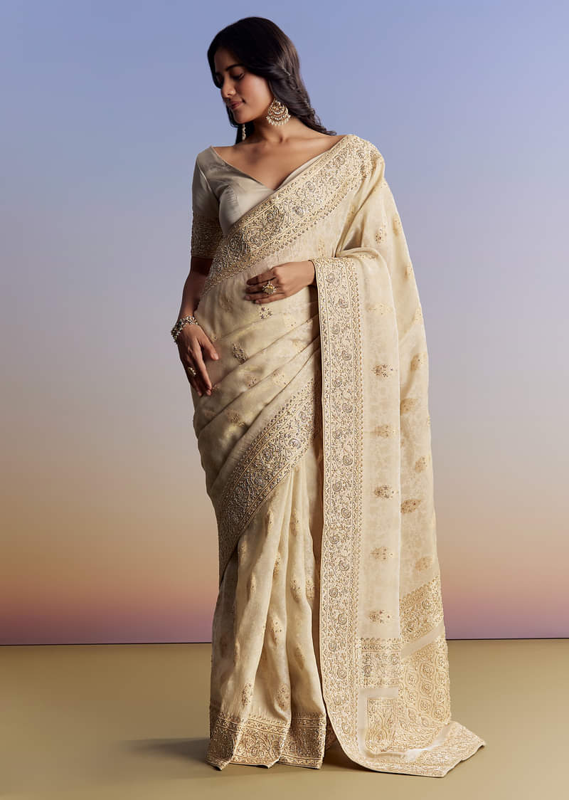 cream-jacquard-silk-saree-with-zari-brocade-and-zardosi-embellished-pallu-sg177295-2_1_c96b31f7-3e35-4b4f-95a7-3eaf55e97ec1.jpg